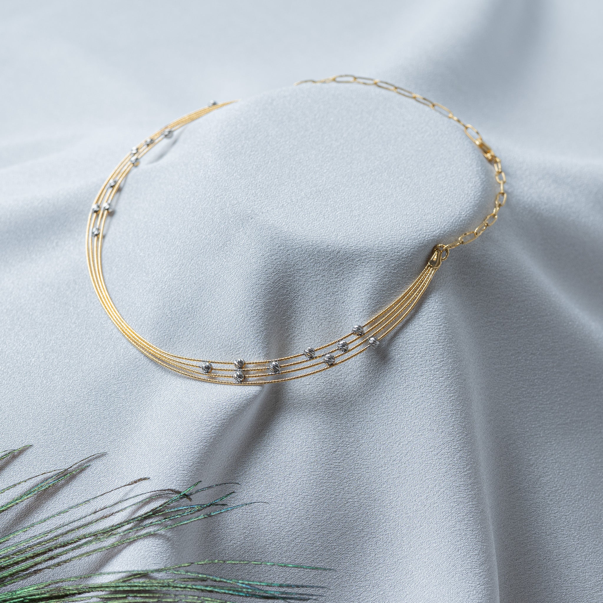 Side view of the four strand collar showing the strands drawing into the end cap