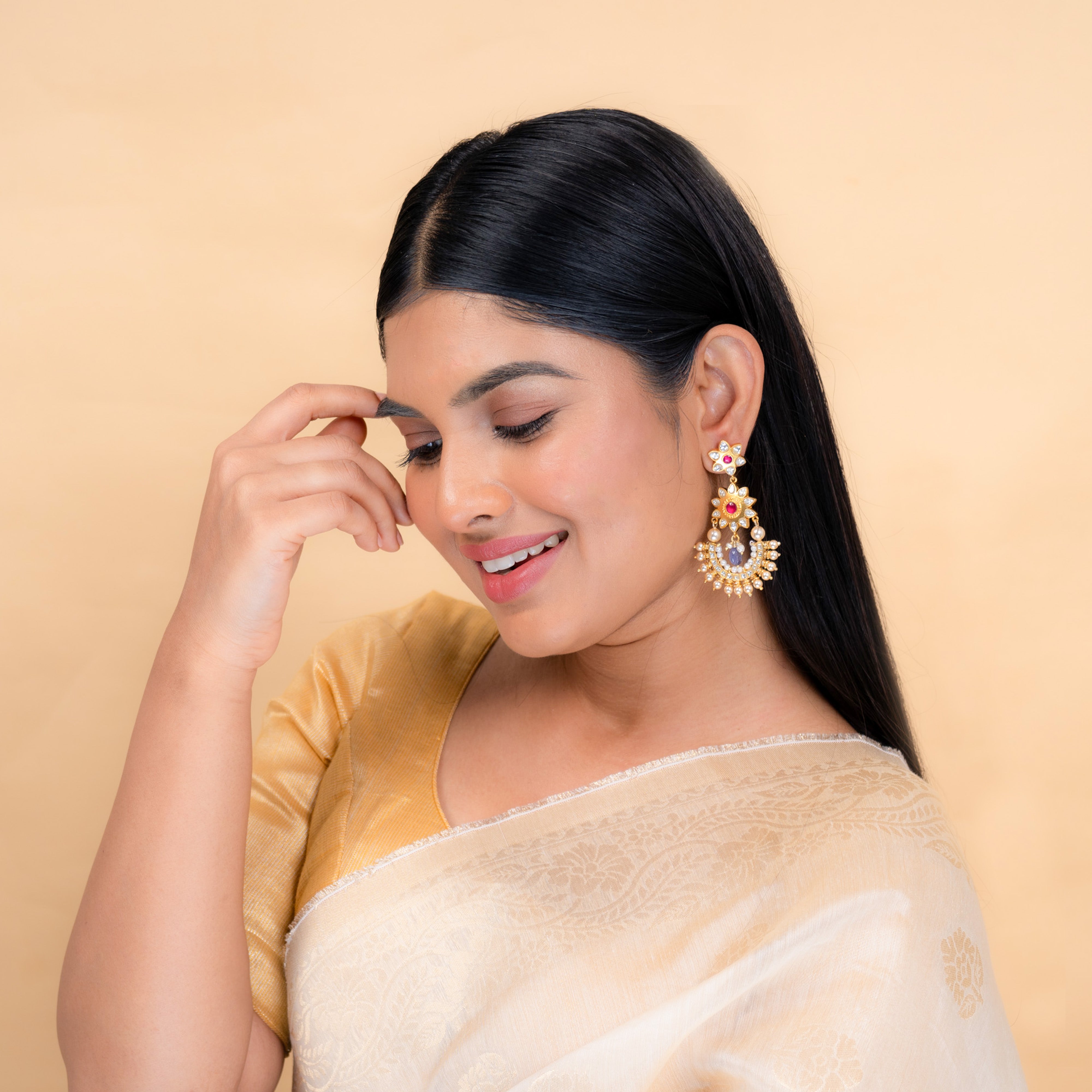 Model wearing Samanya Jadau Chand Bali earrings for festive and wedding occasions