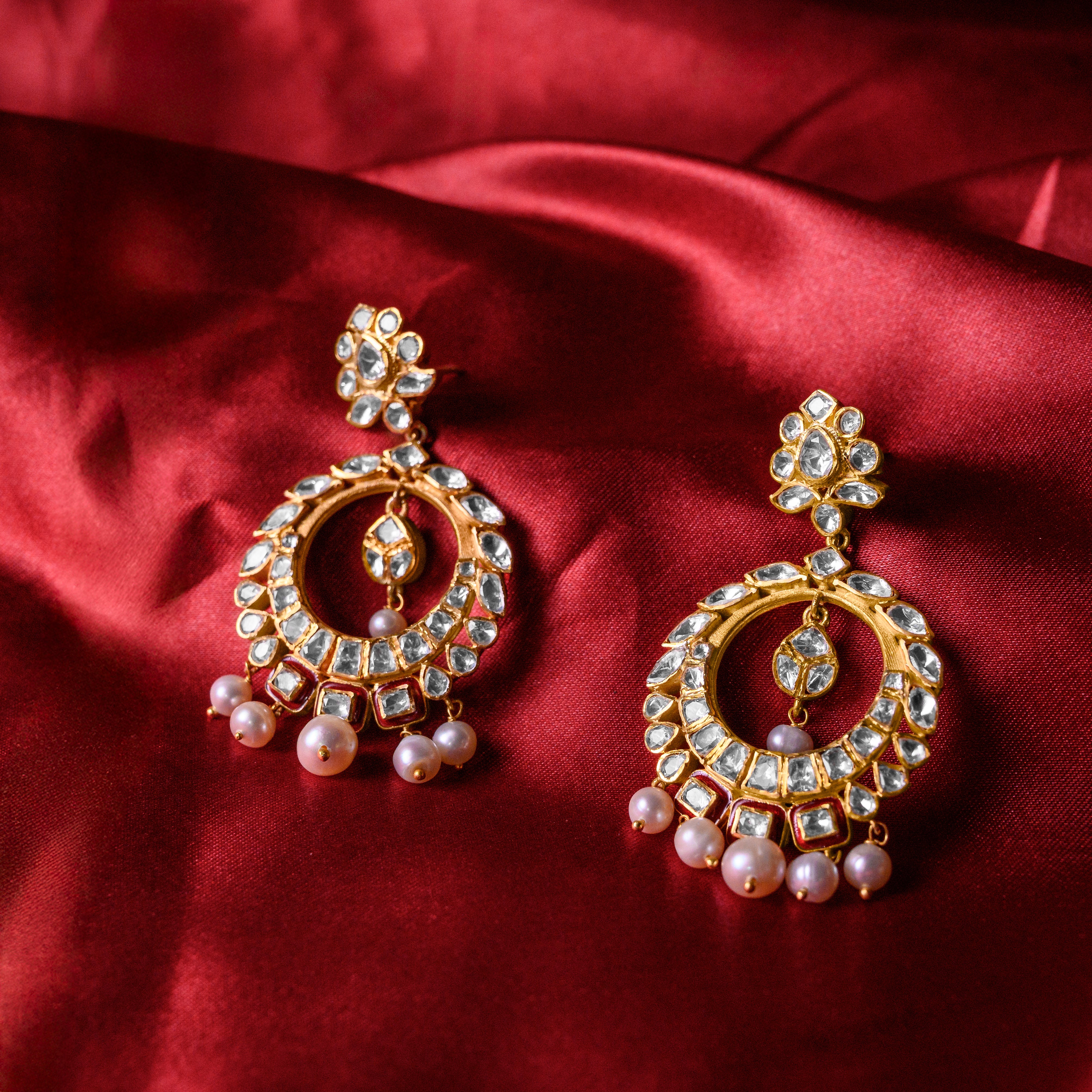 Close-up of Solstice Polki Chand Bali red highlighting polki craftsmanship and pearls