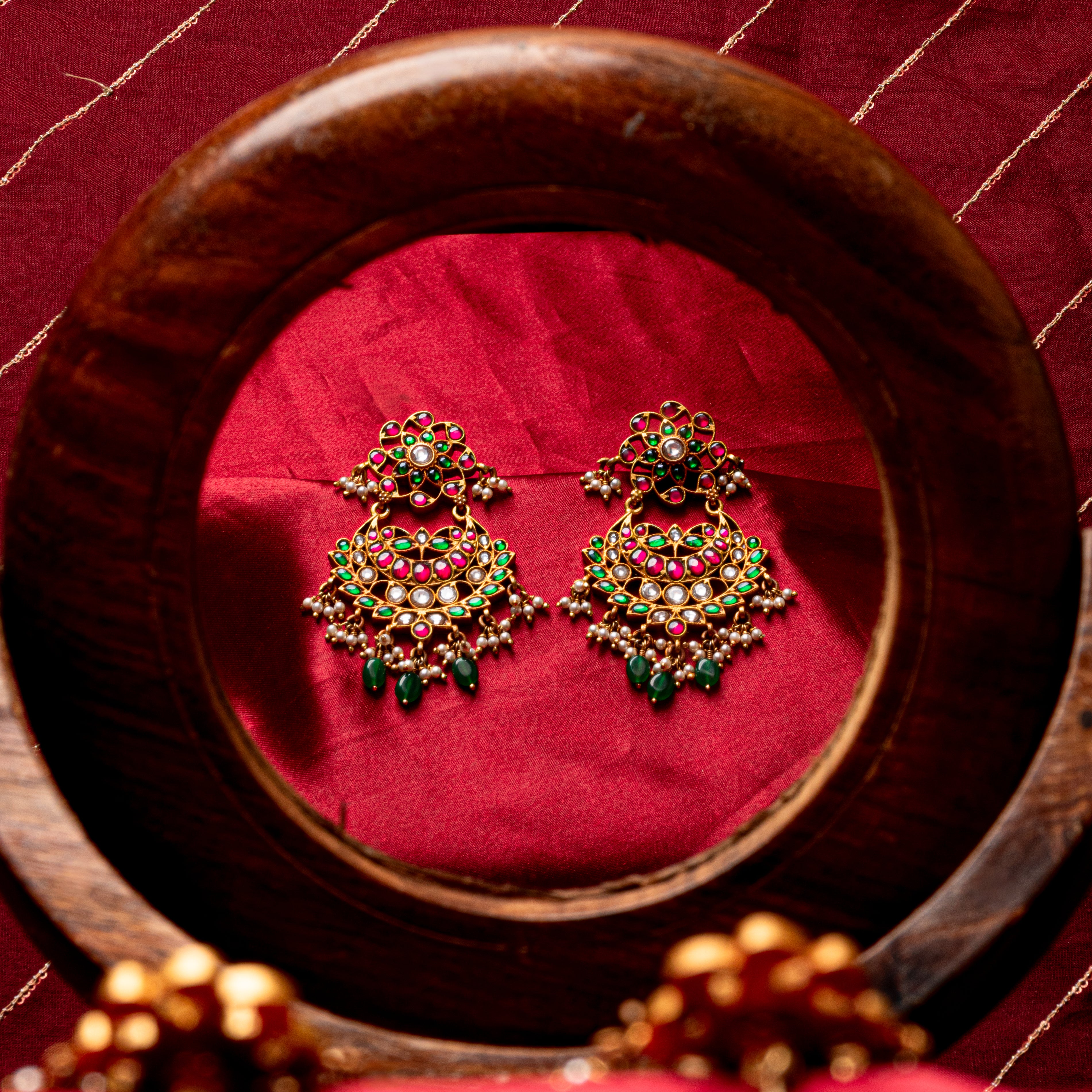 Heer Meena Chand Bali earrings displayed showcasing traditional festive design