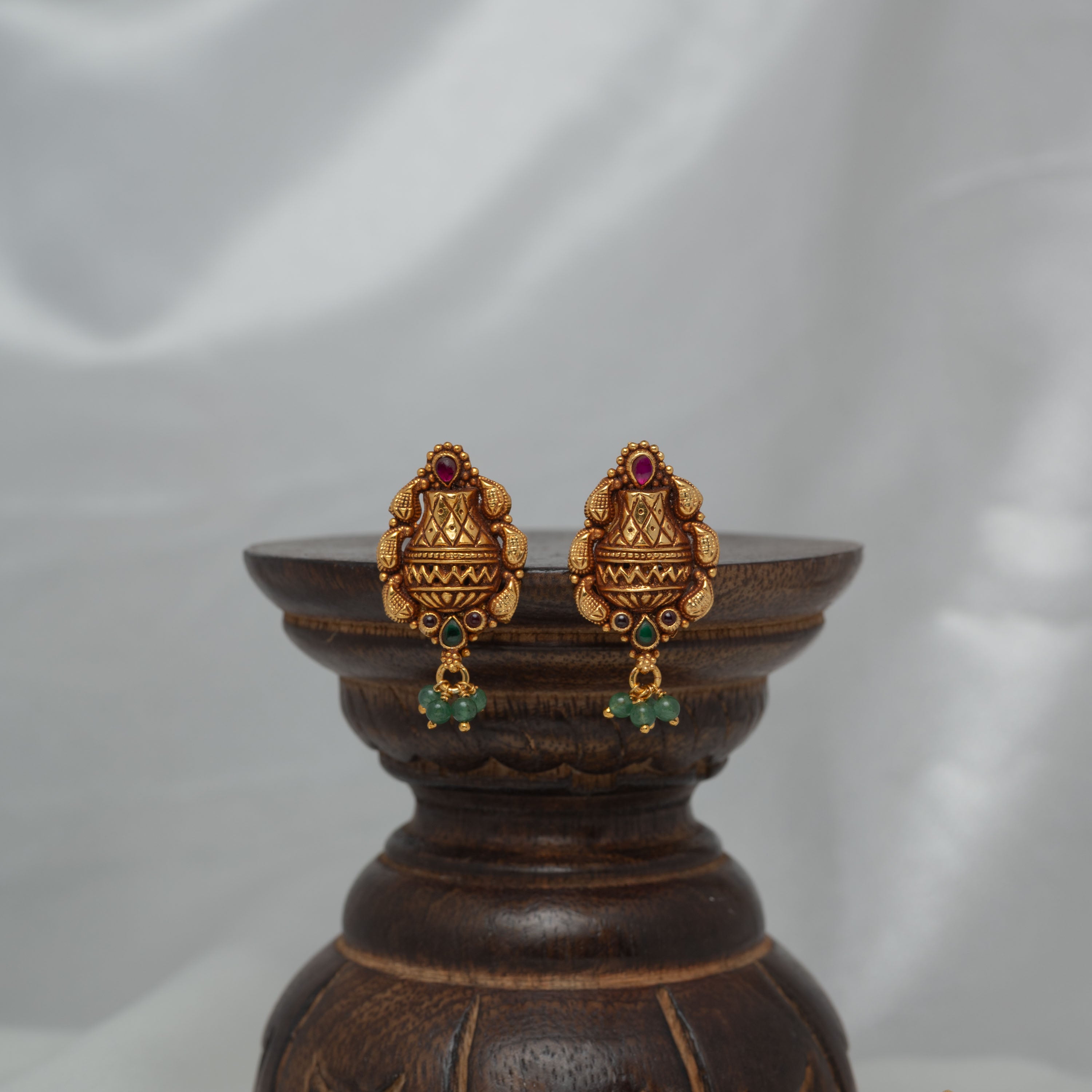 Kalash pot stud with a red kundan pear stone in antique gold 925 silver temple hangings