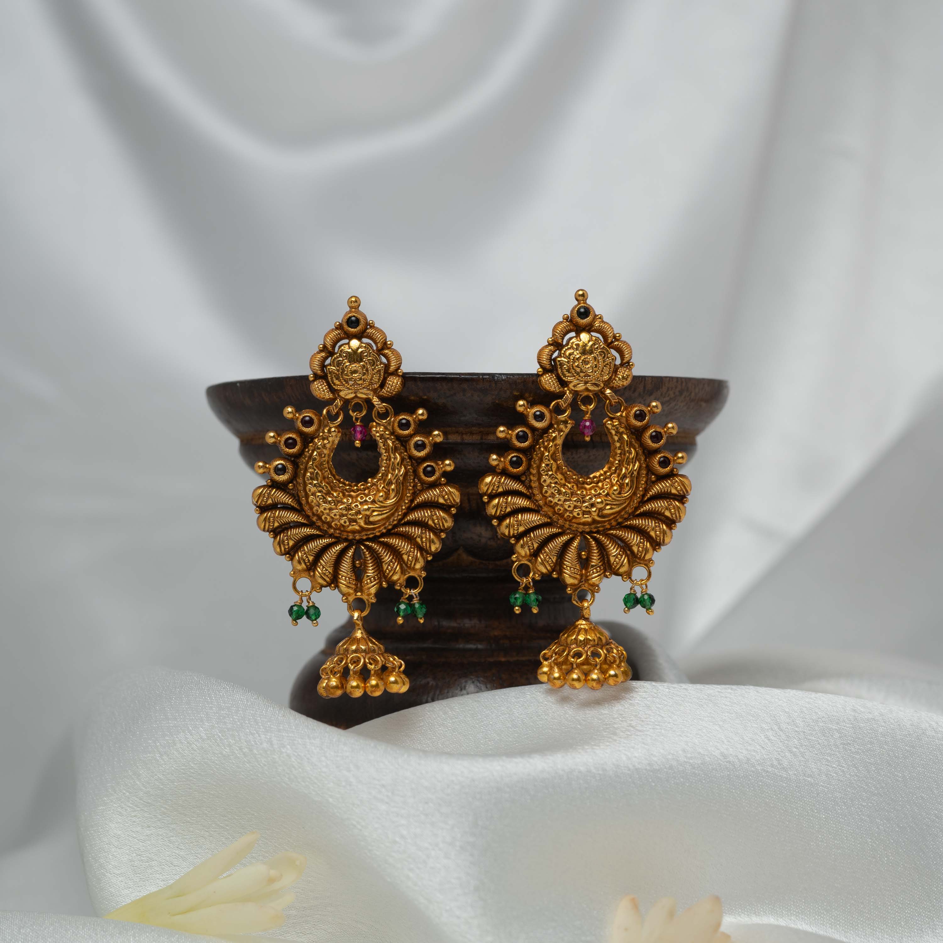 Large chand bali with a fanned peacock plume in antique gold 925 silver and a jhumka drop