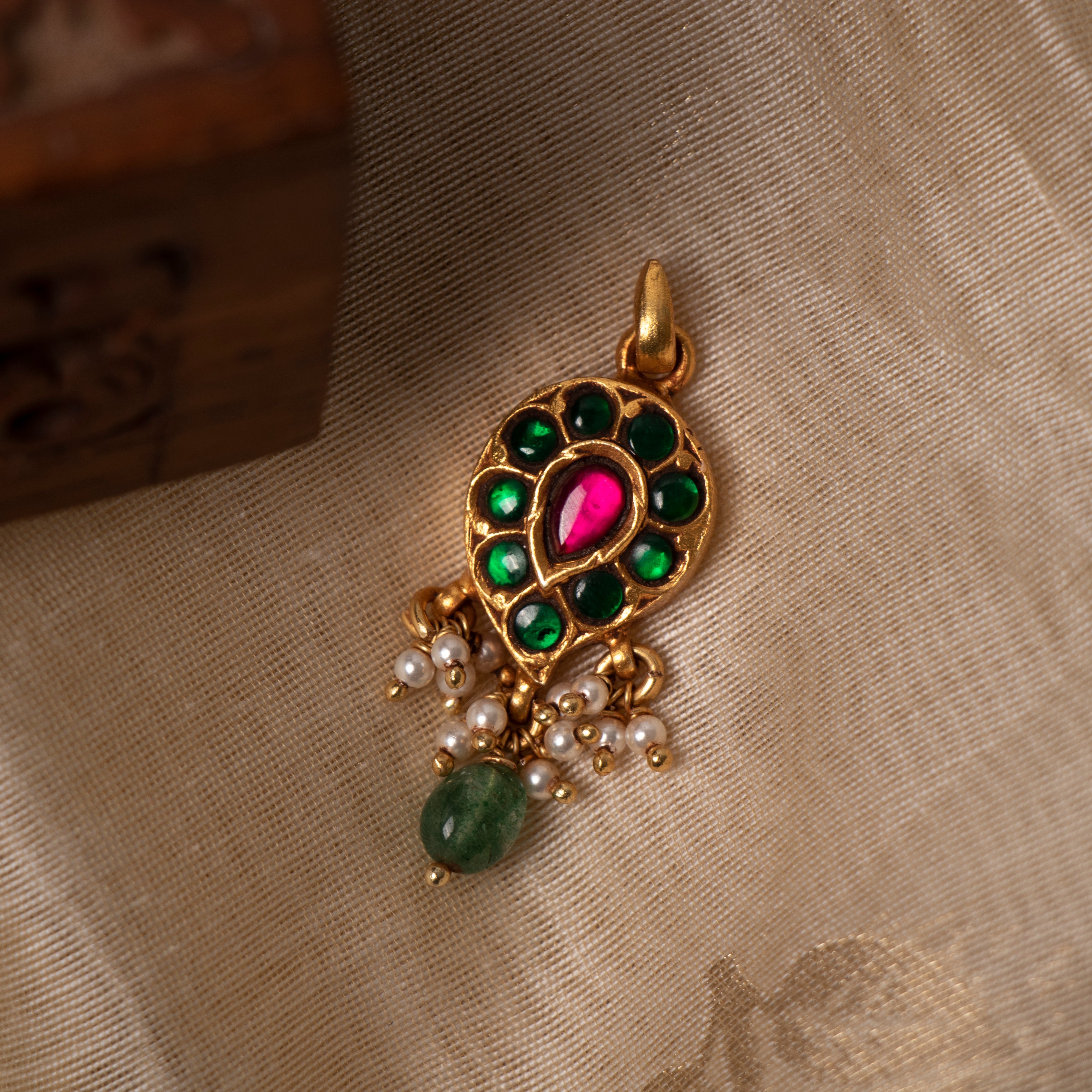 Amprapali traditional silver pendant with kundan accents and elegant craftsmanship