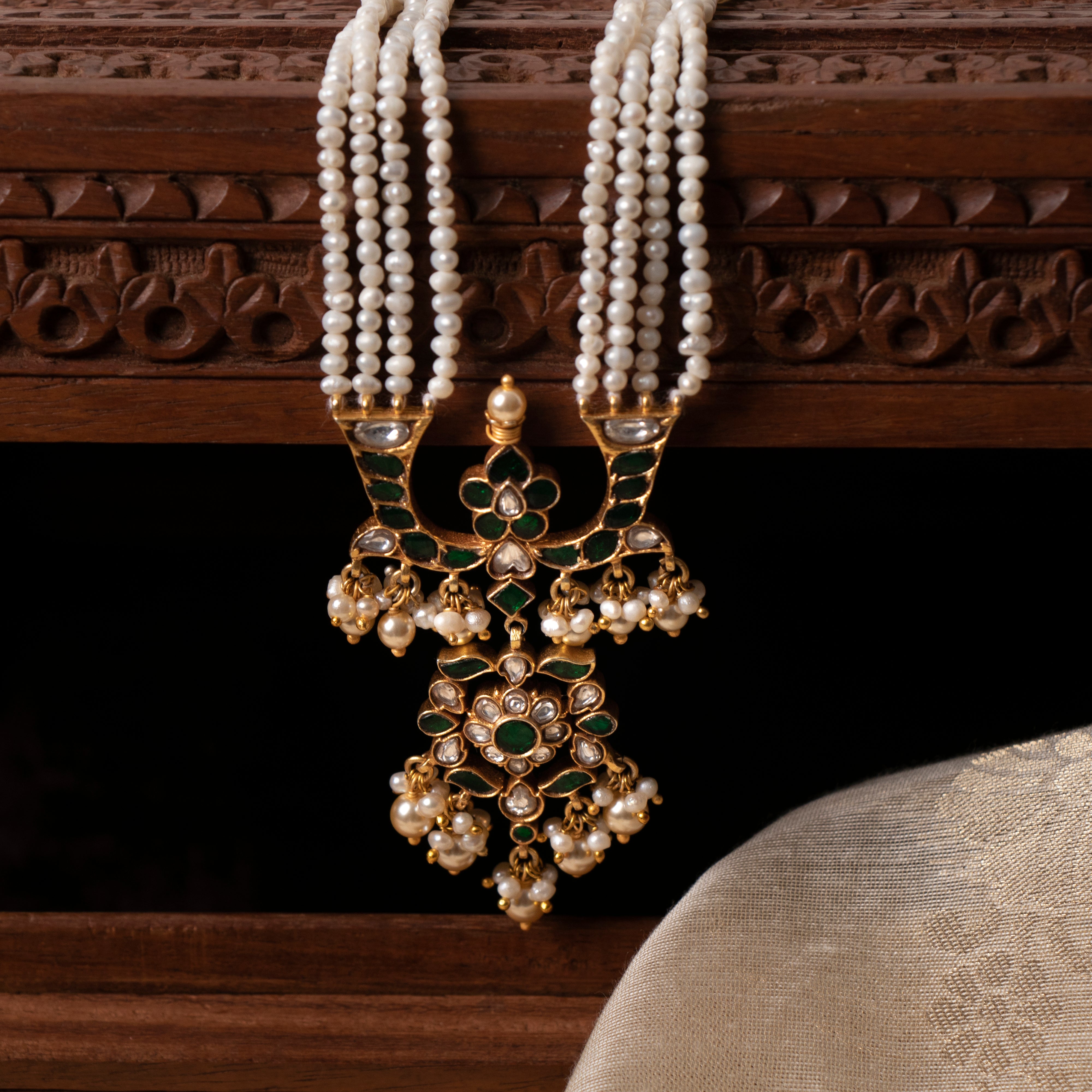 Handcrafted kamal kundan pendant mala with green stone and pearl strands