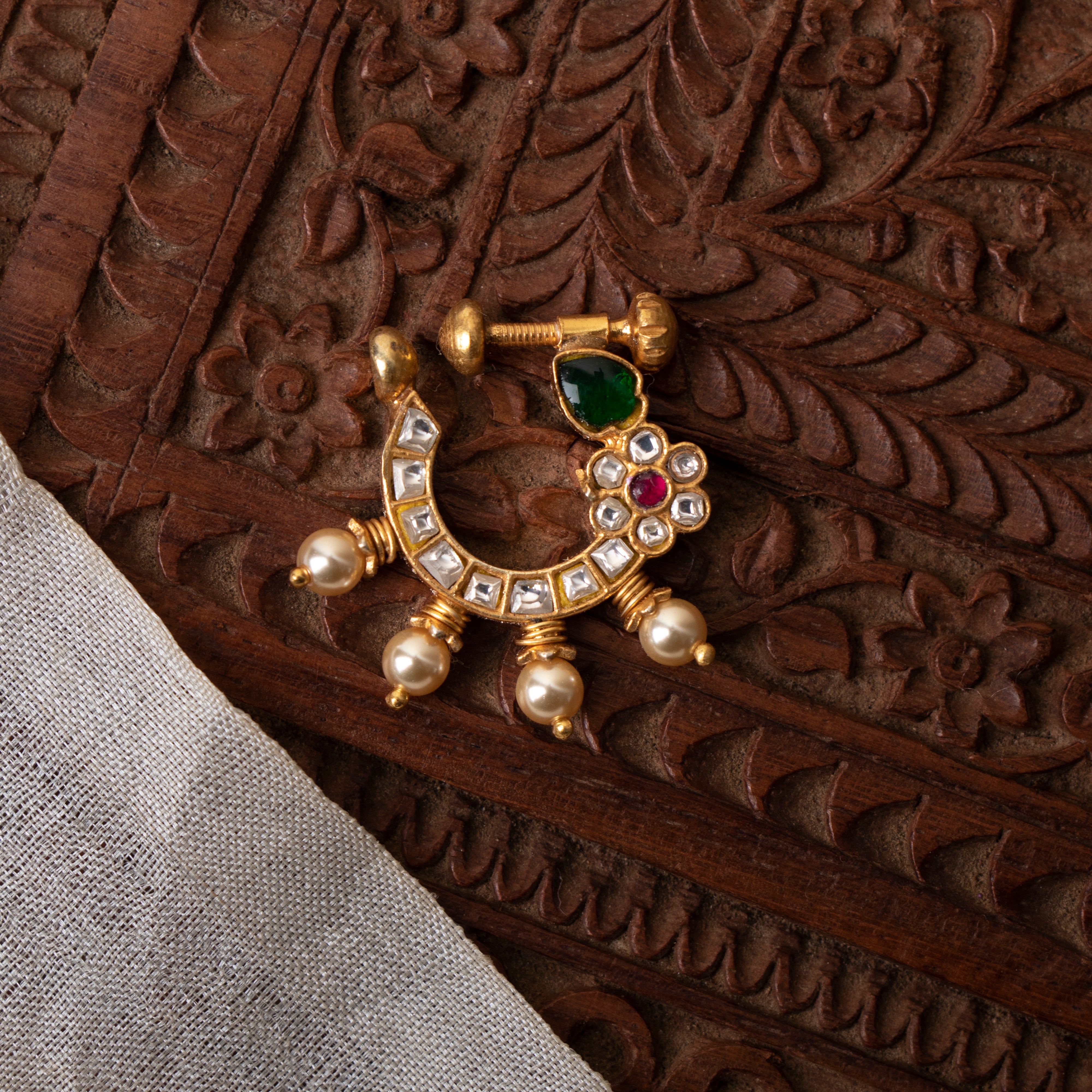 Side view of Chandini white kundan nath showcasing handcrafted silver design