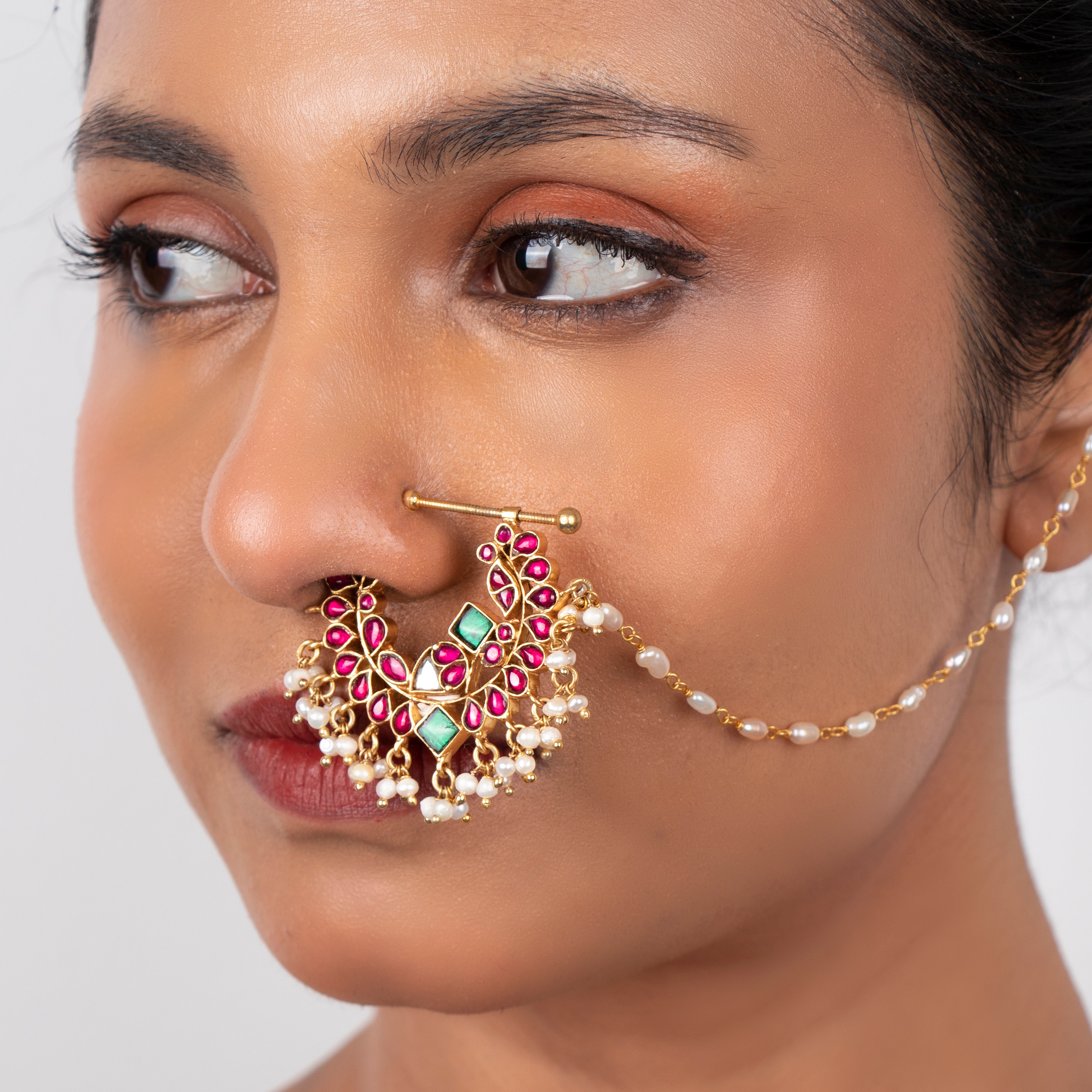 Mukhuti Nath nose ring worn showing elegant Kundan and pearl styling