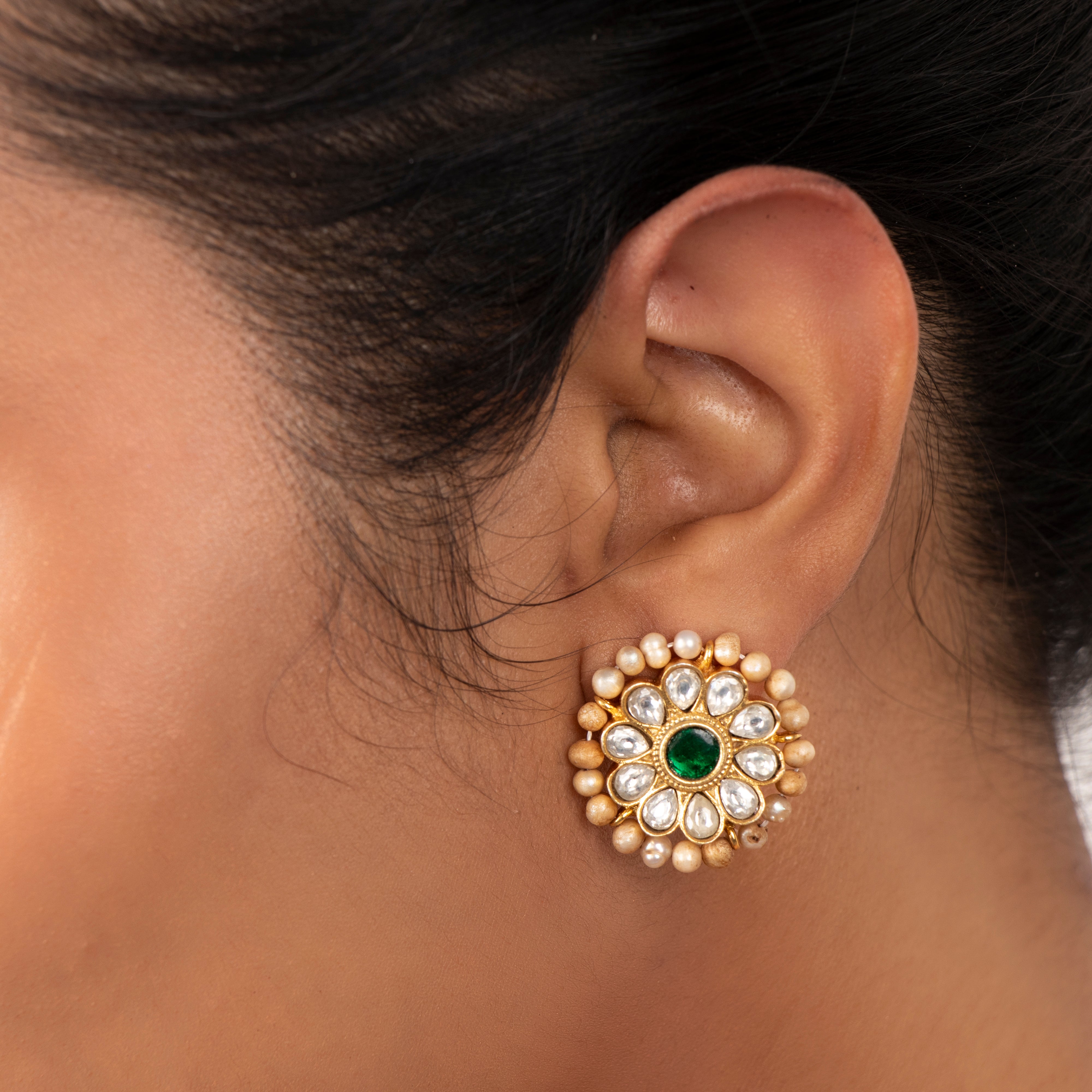 IvorySpark kundan pearl earrings worn on ear showing elegant styling