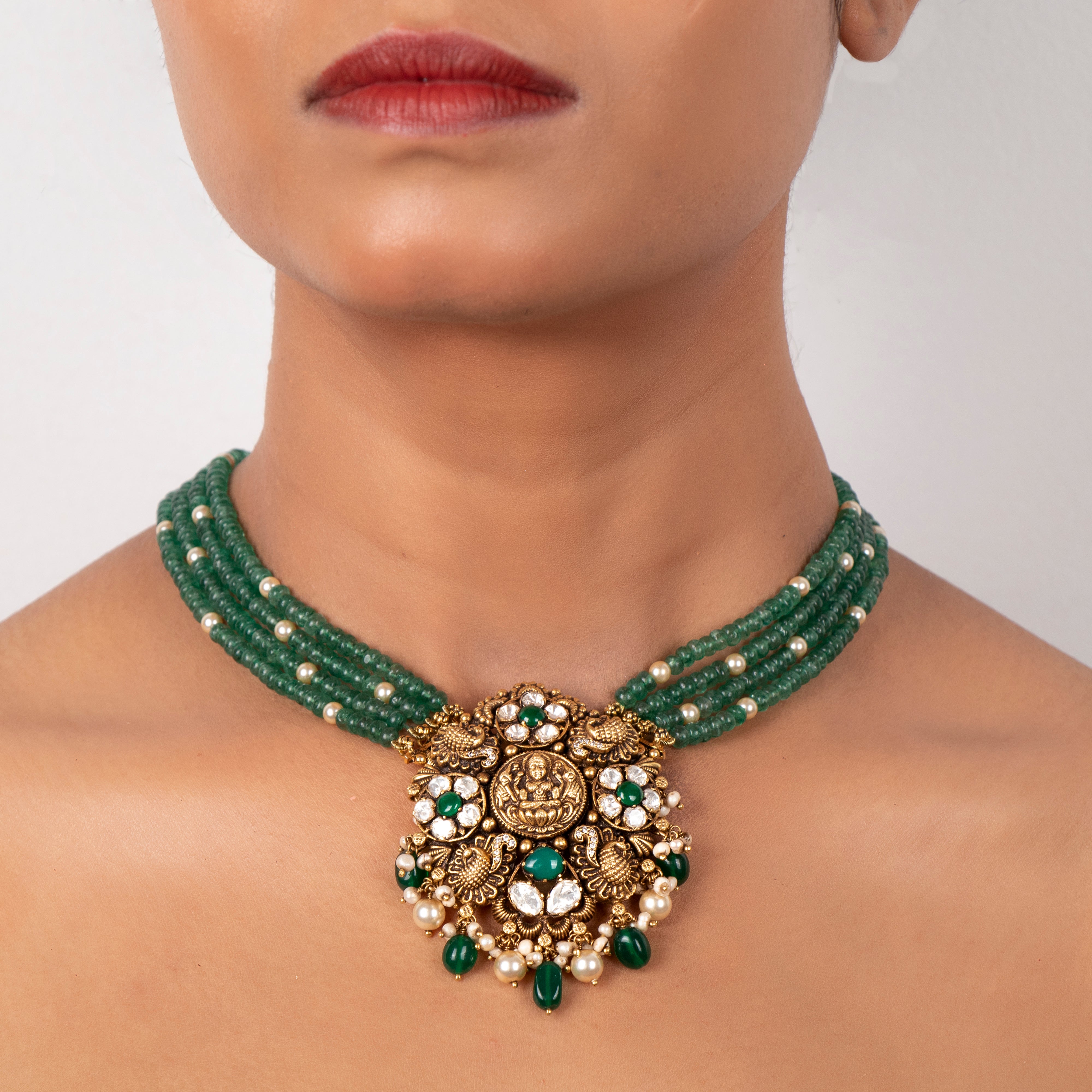 Close-up of Lakshmi motif on Ipshita 925 silver Nakaas pendant with moissanite stones