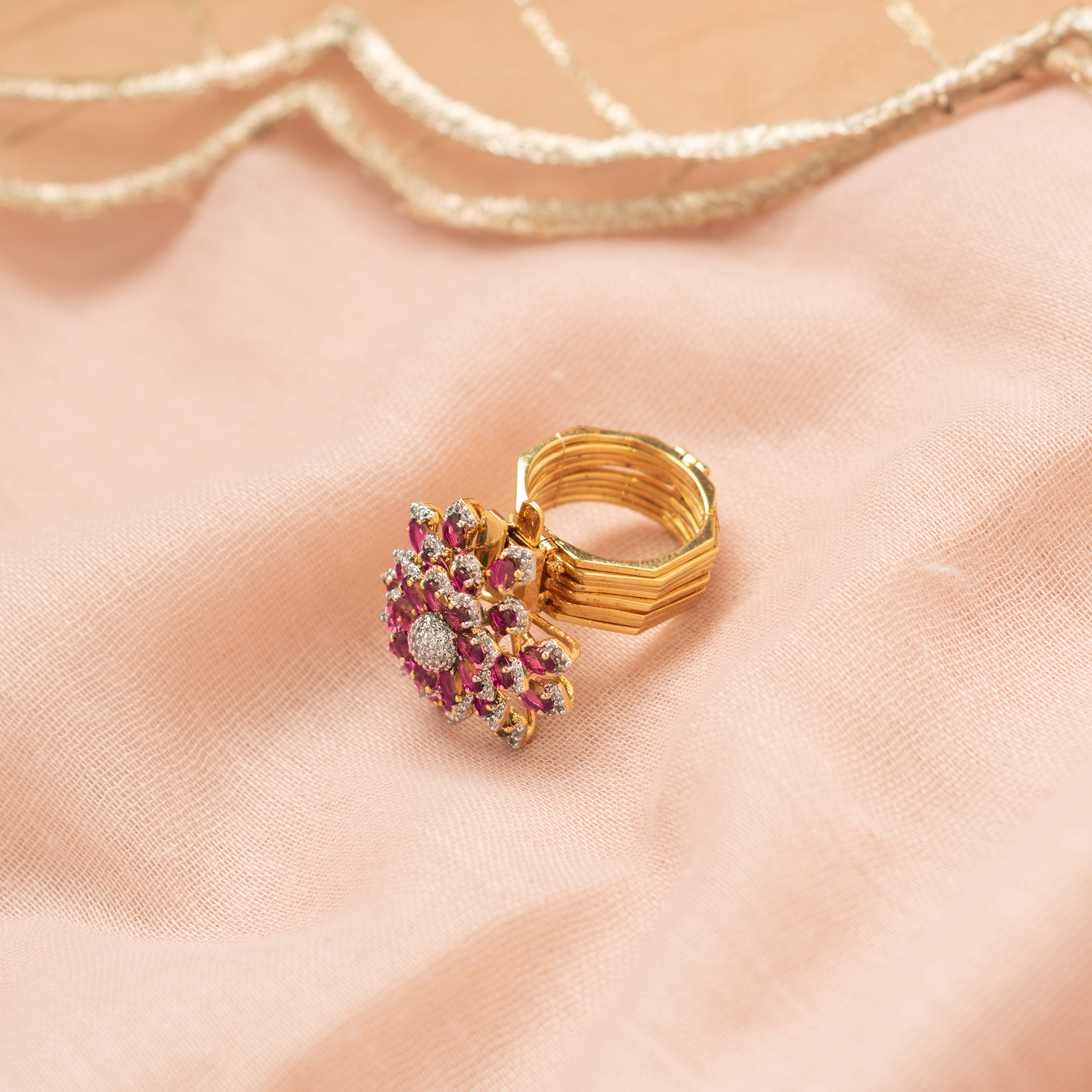 Avira pink polki ring and bracelet set with gold finish for festive wear