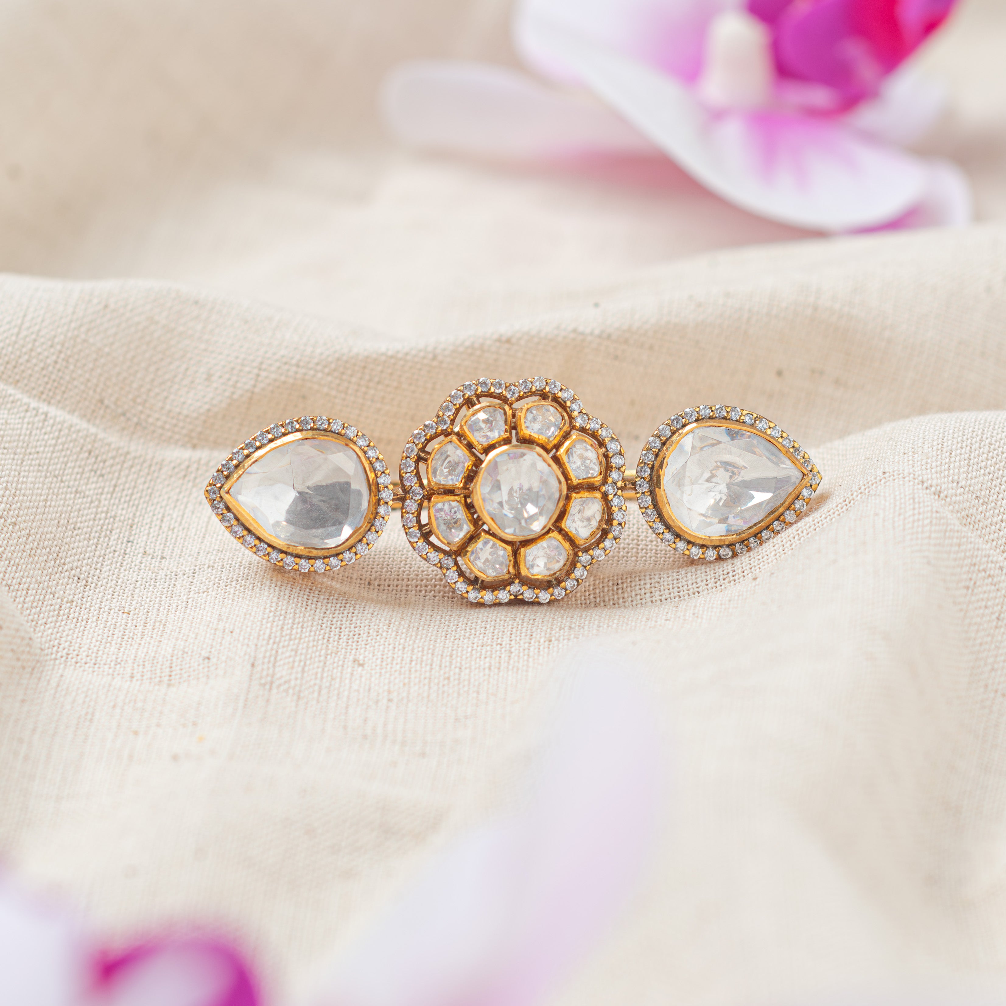 Naaz Victorian floral polki ring with pear-shaped stones and gold polish