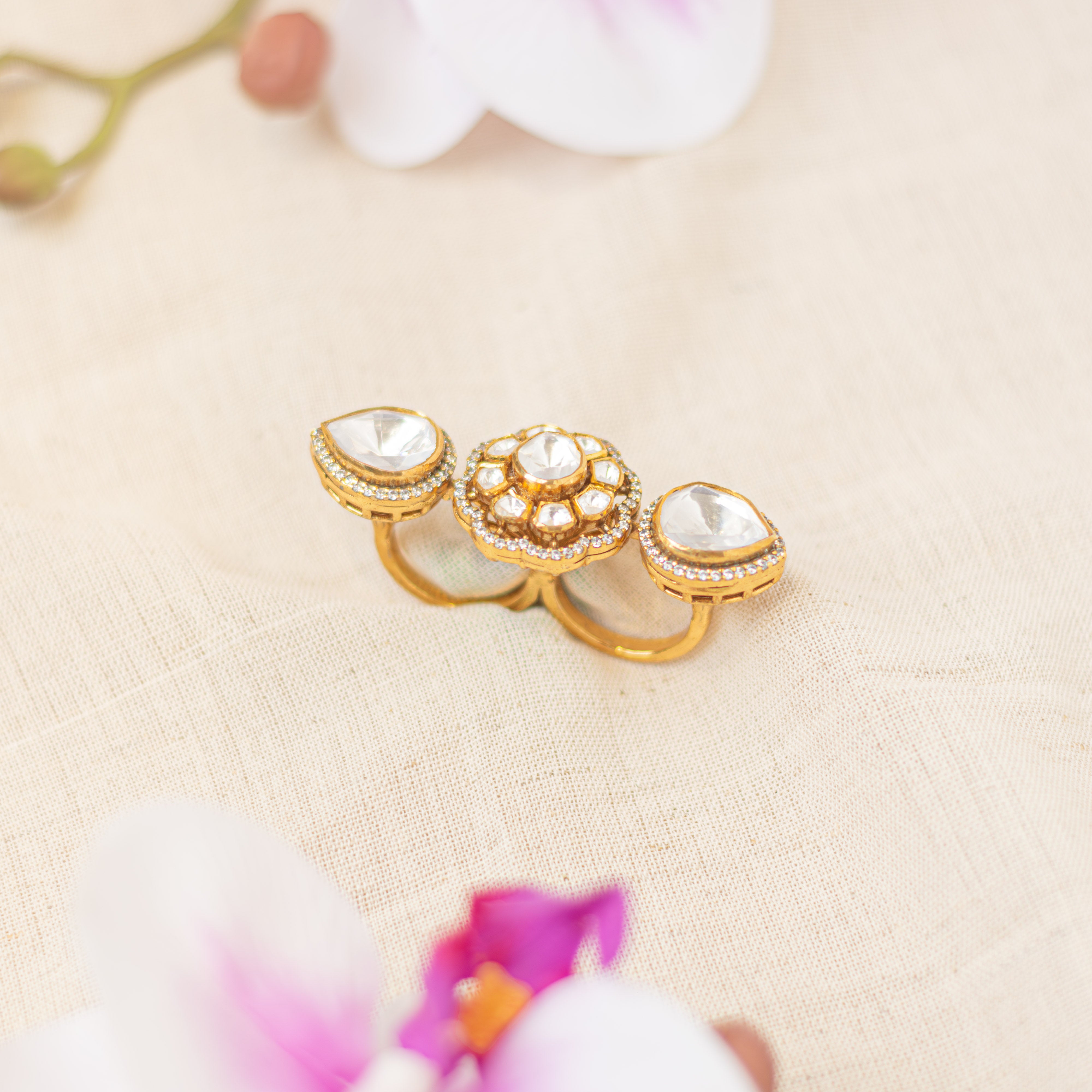 Side angle view of Naaz Victorian polki statement ring with floral motif