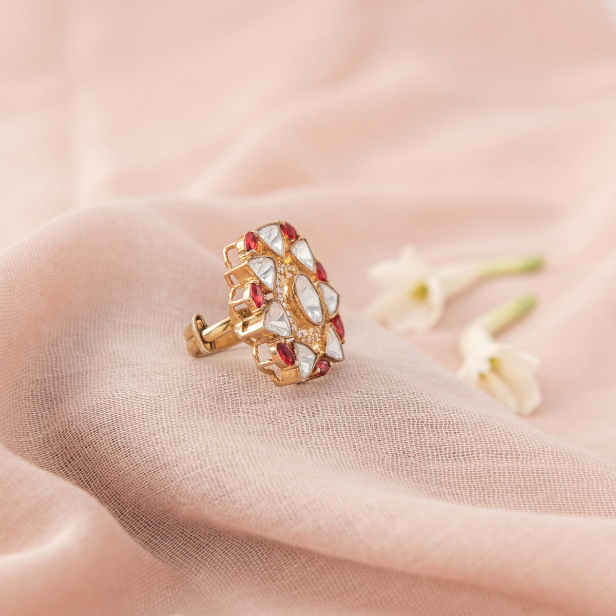 Ruby red marquise points at either end of the oval polki centre, gold plated 925 silver