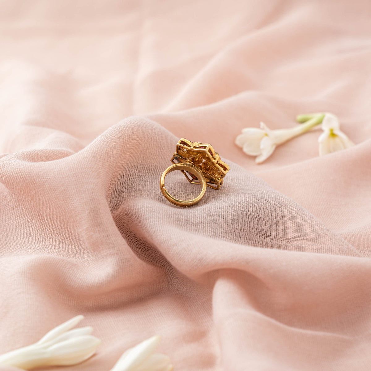 Star shaped marquise face and adjustable band of the kundan and polki ring, gold plated 925 silver
