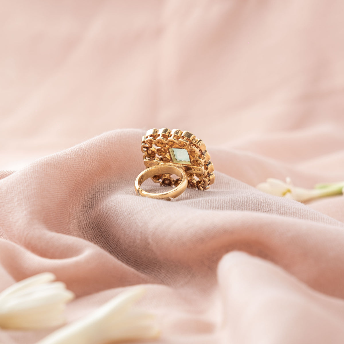 Square ring face turned to show the carving and the adjustable band, gold plated 925 silver