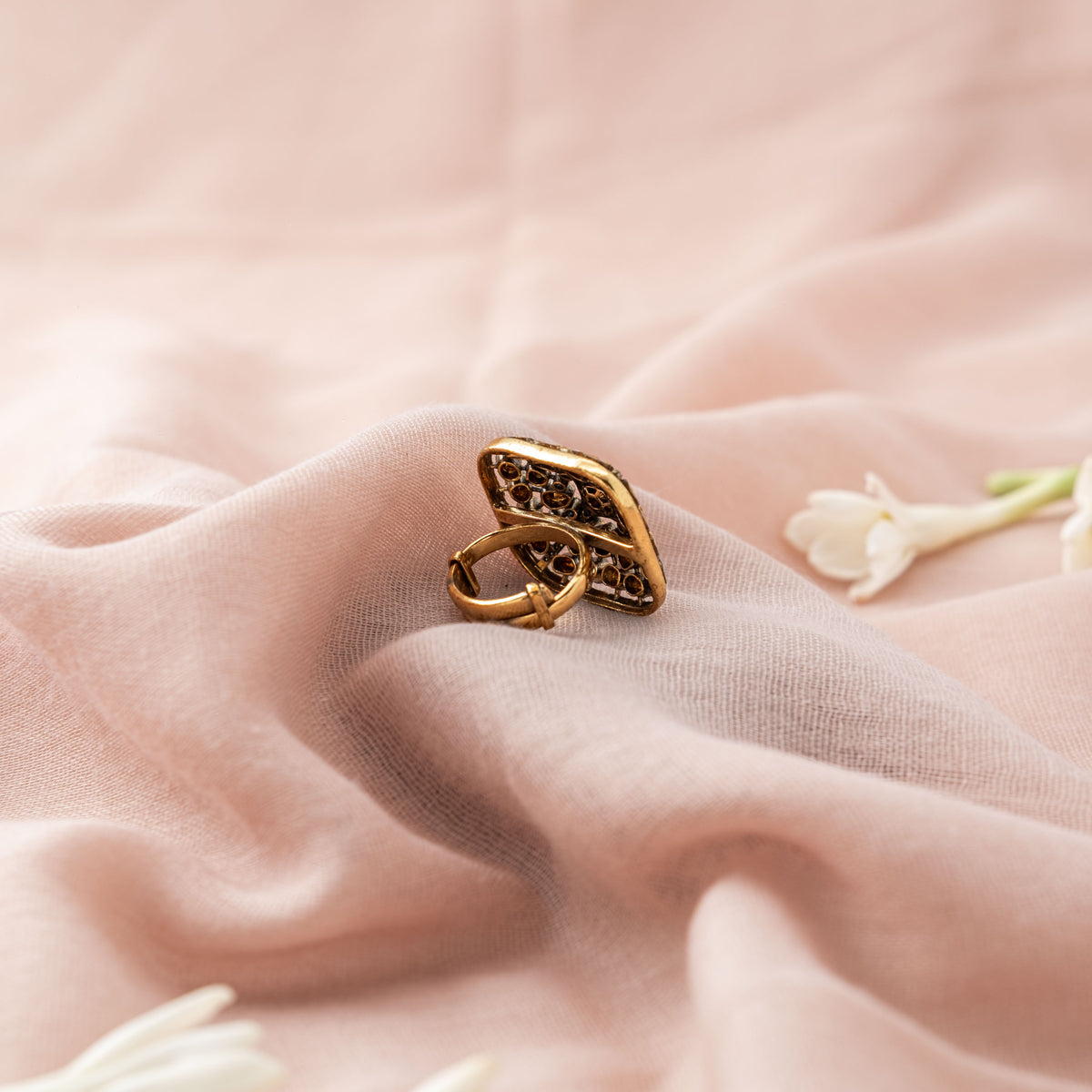 Side profile of the cushion square ring face and its open adjustable band in Victorian finish silver