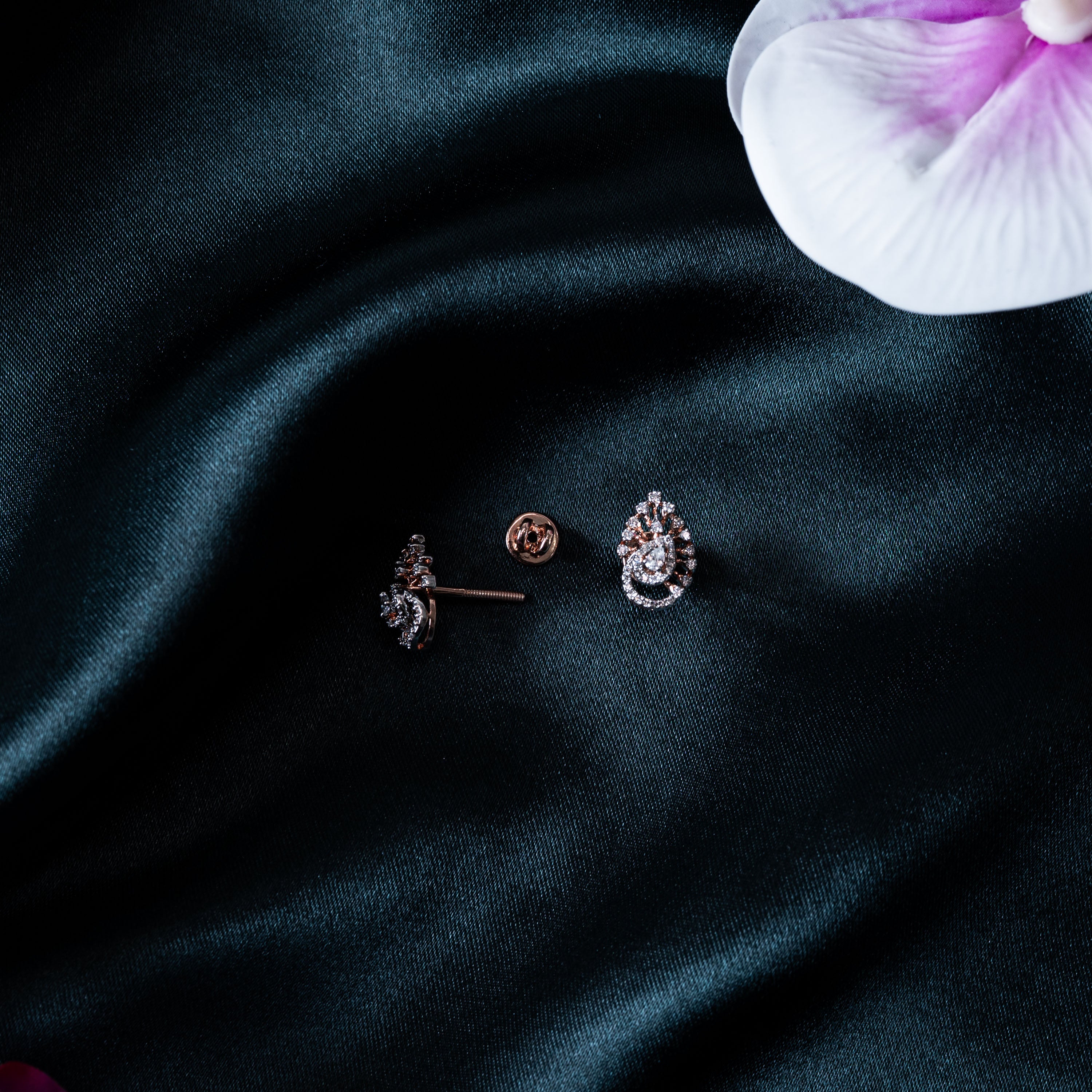 Close crop of the paisley studs paved with CZ stones, rose gold plated 925 silver