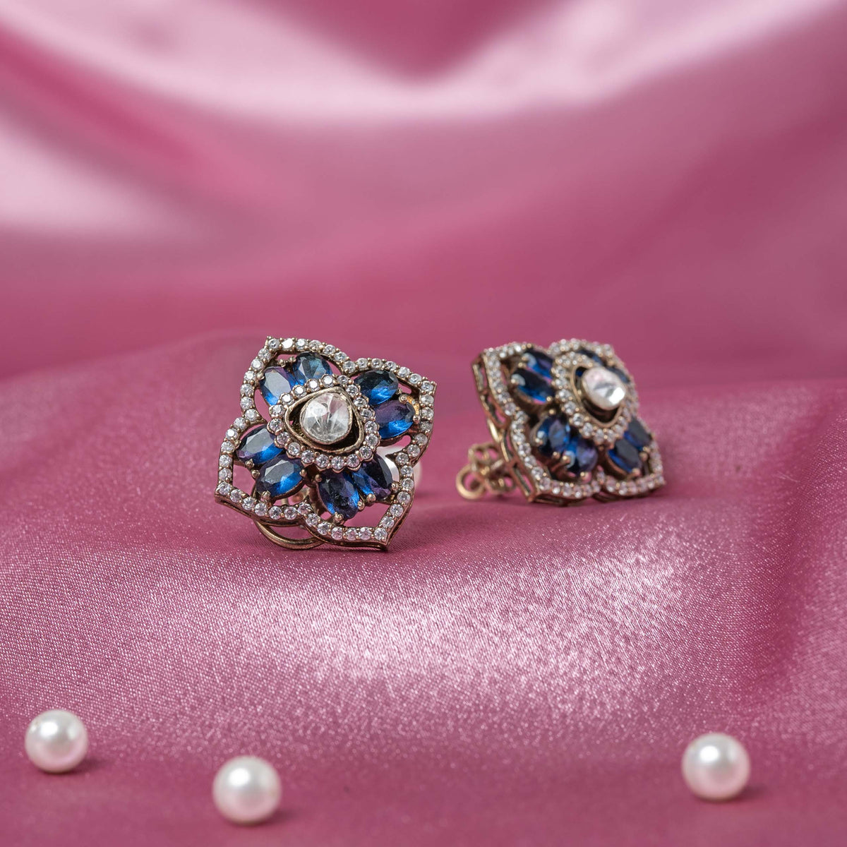 Deep blue marquise stones and CZ set around a polki drop centre on Victorian finish 925 silver studs