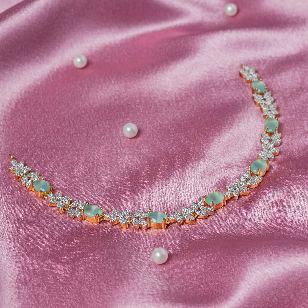 Leaf motif CZ necklace with oval turquoise-green stones in 925 silver
