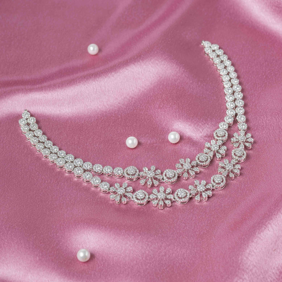 Graduated white CZ necklace with adjustable dori in bright 925 silver