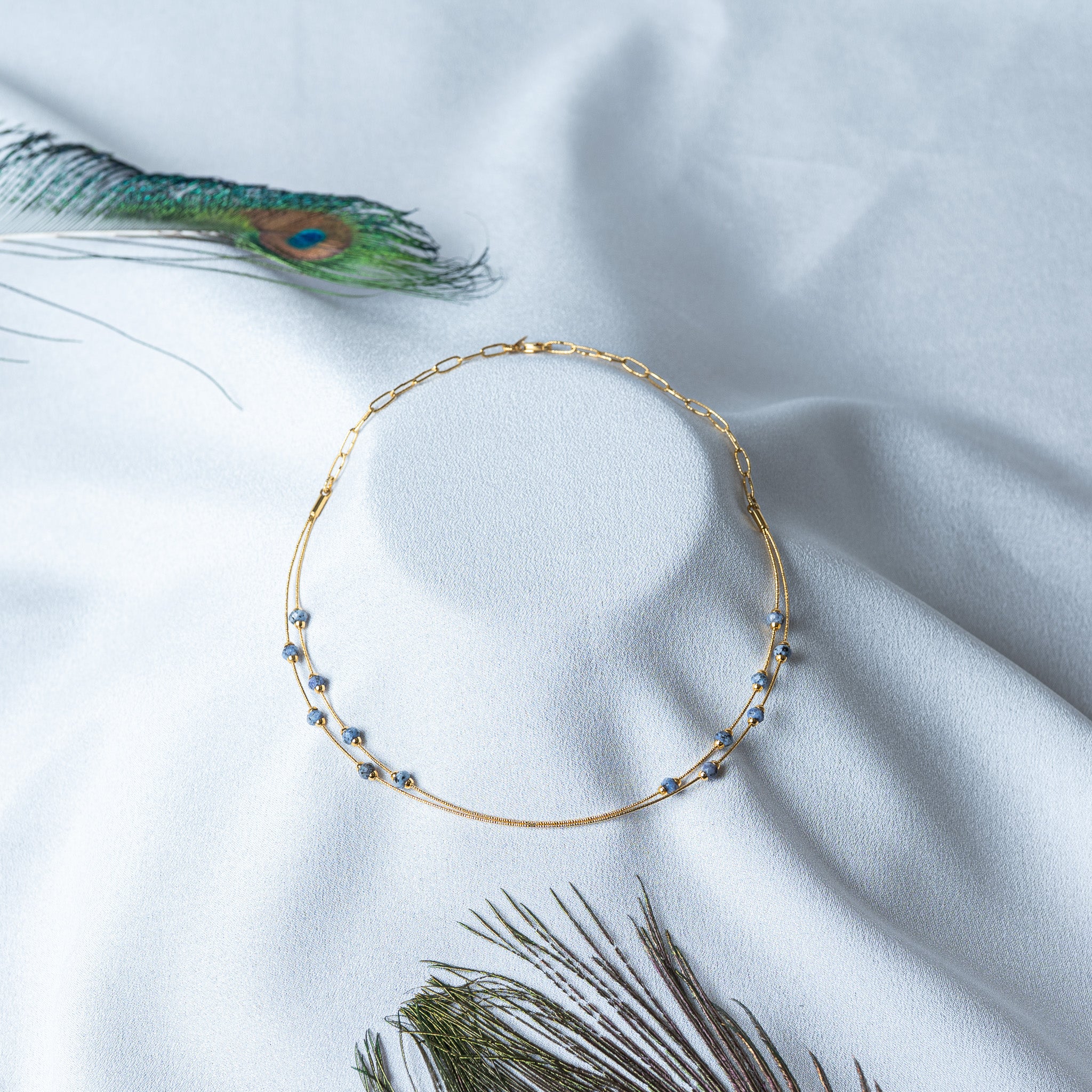 Blue grey stone bead stations along two fine gold snake strands, 925 silver collar