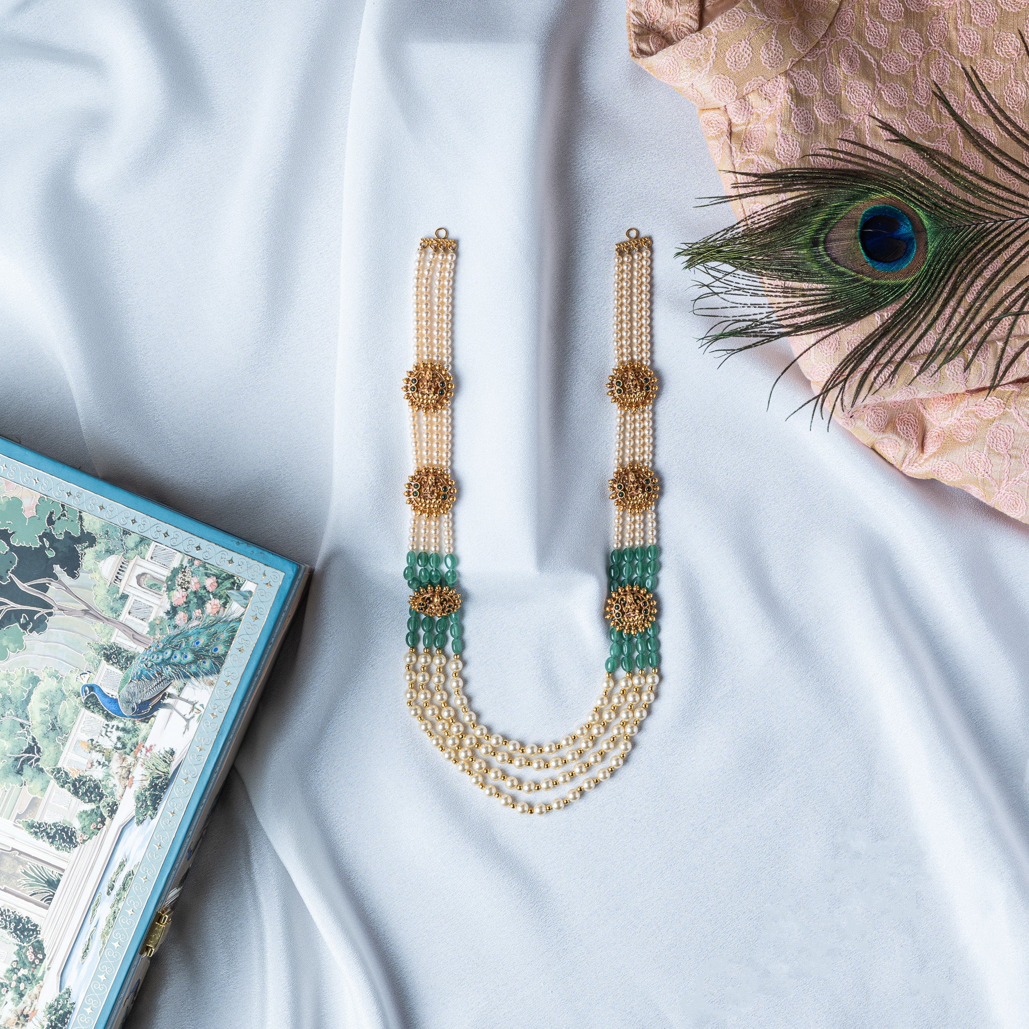 Nakaas necklace with six seated Lakshmi motifs on four strands of shell pearls, gold plated 925 silver