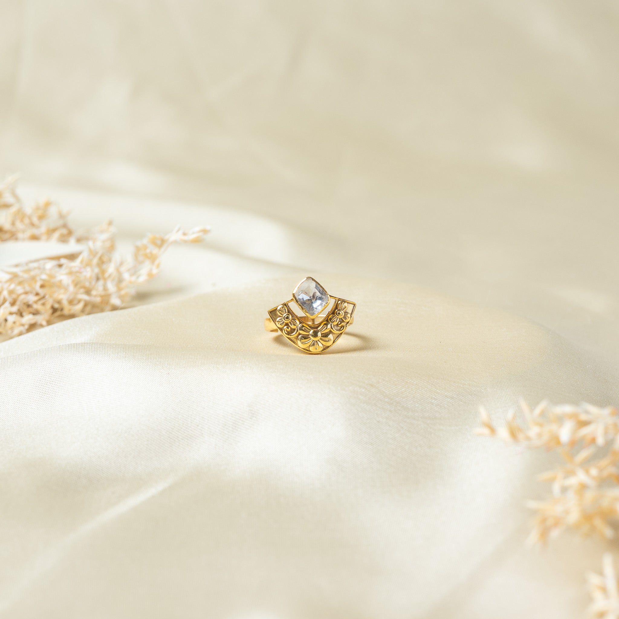 Square polki ring with a pierced daisy fan below the stone in gold plated 925 silver