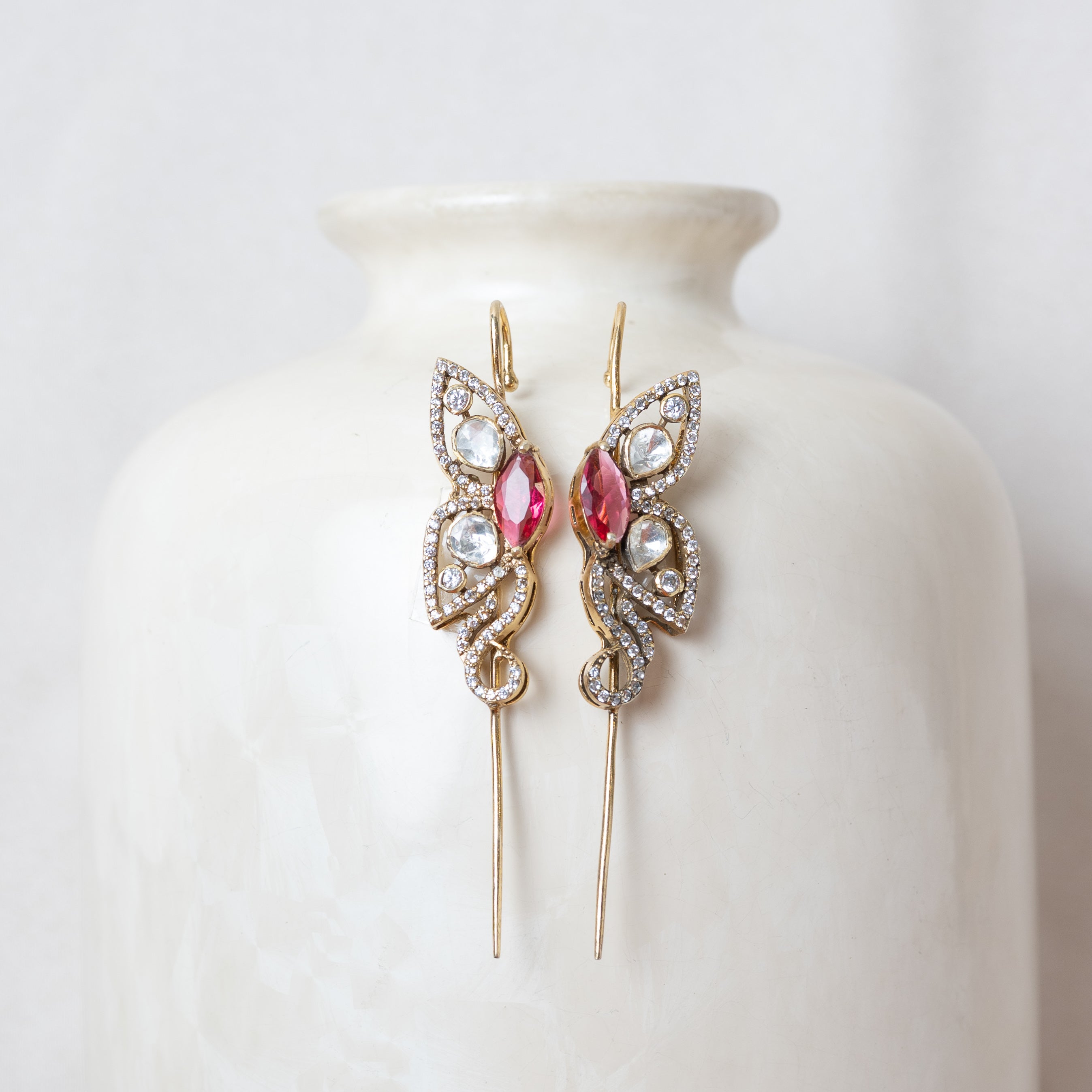 Victorian ear cuff with a faceted pink marquise and CZ pave wings in gold plated 925 silver