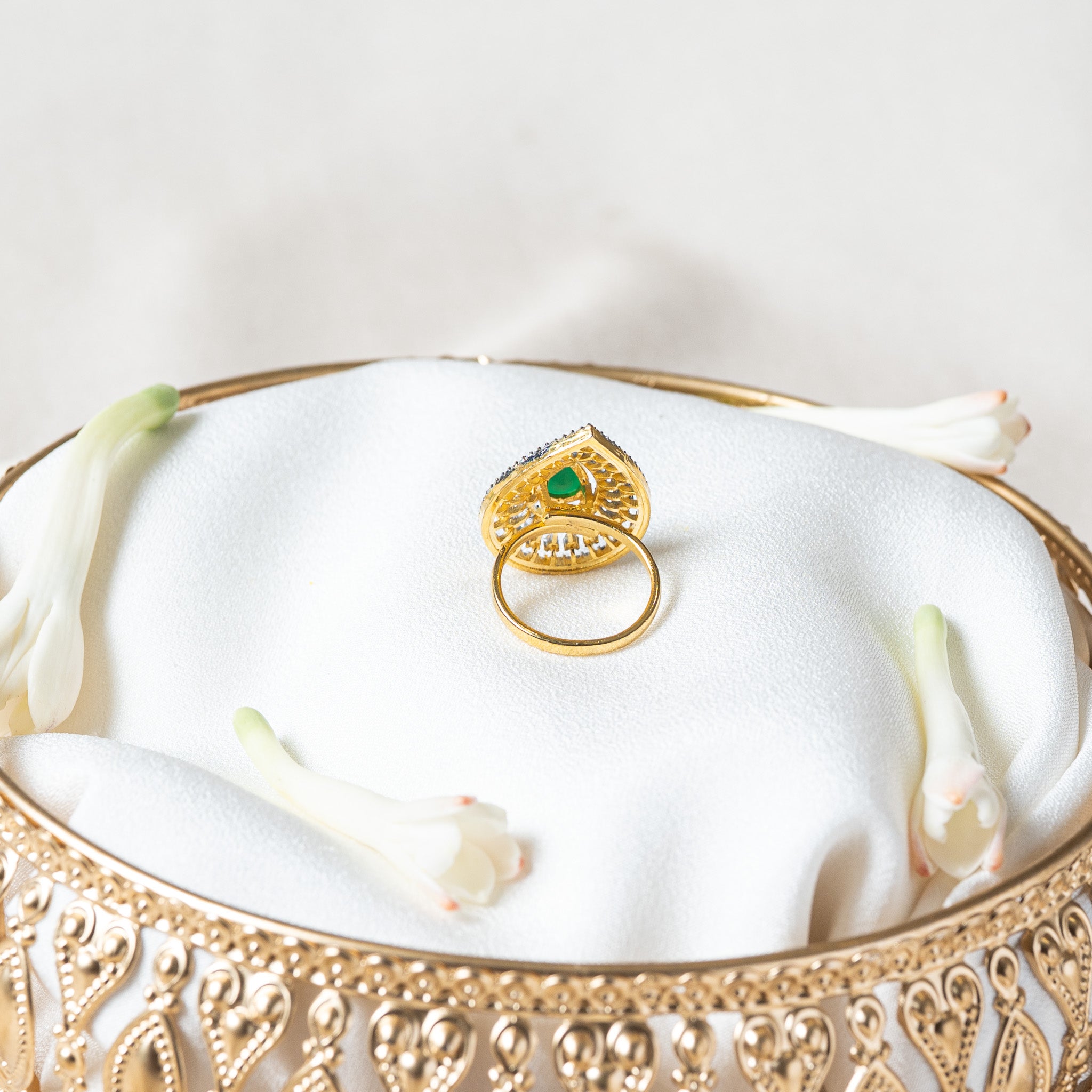 Back of the teardrop ring showing the plain closed gold band, made to a fixed ring size