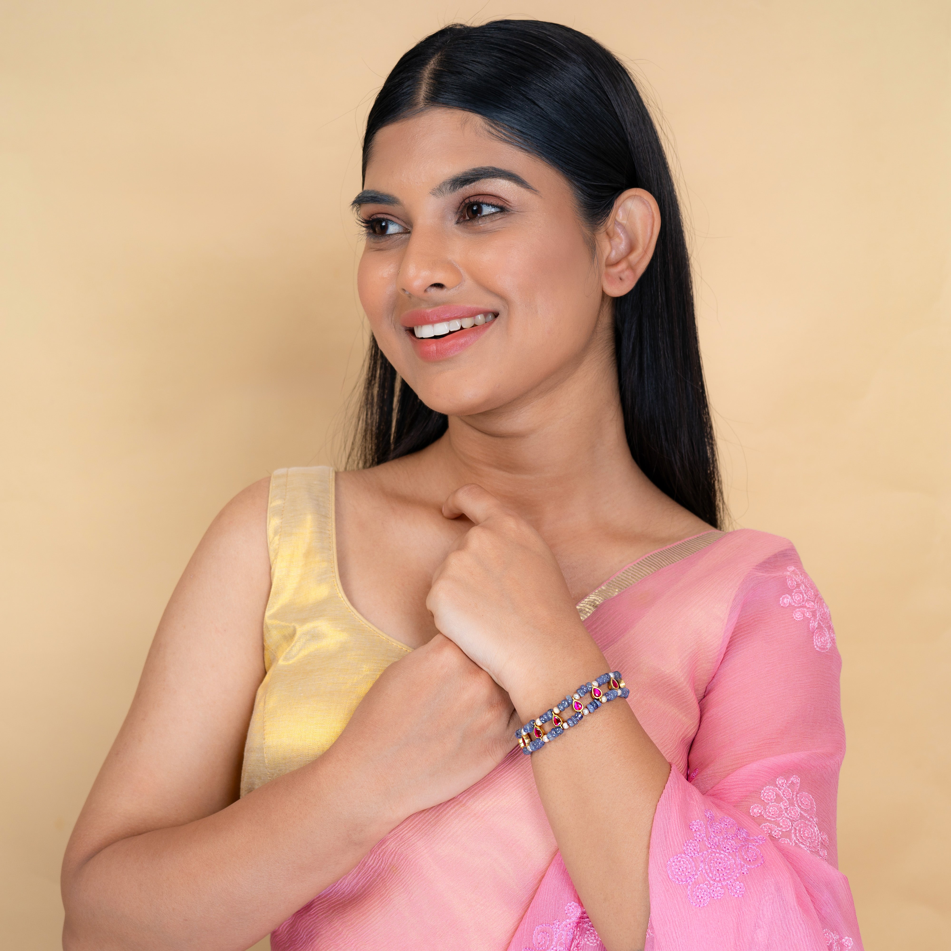 Model wearing Zelda Kundan bracelet styled with traditional attire
