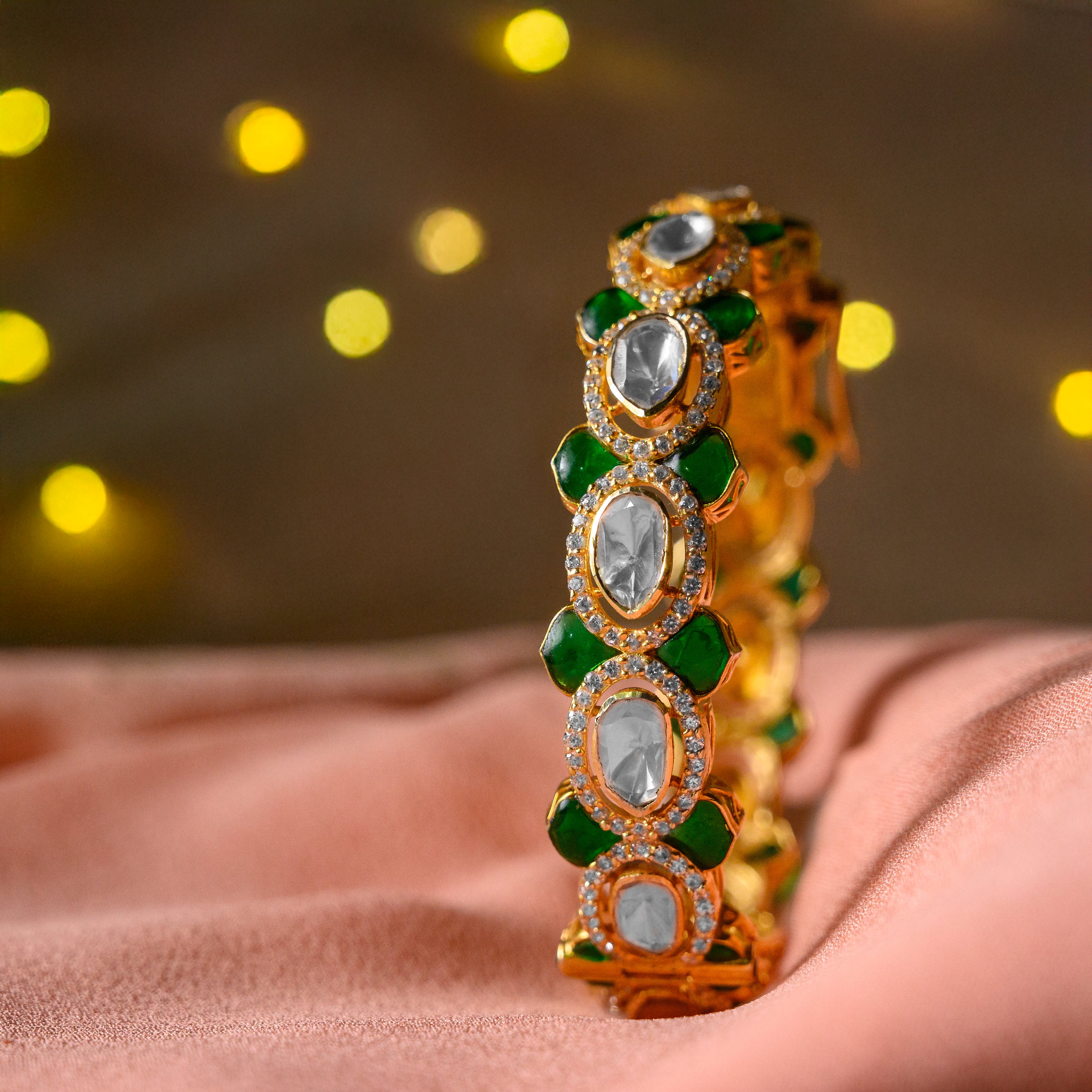 Zyra Gleam Polki silver bangle featuring moissanite and green stones