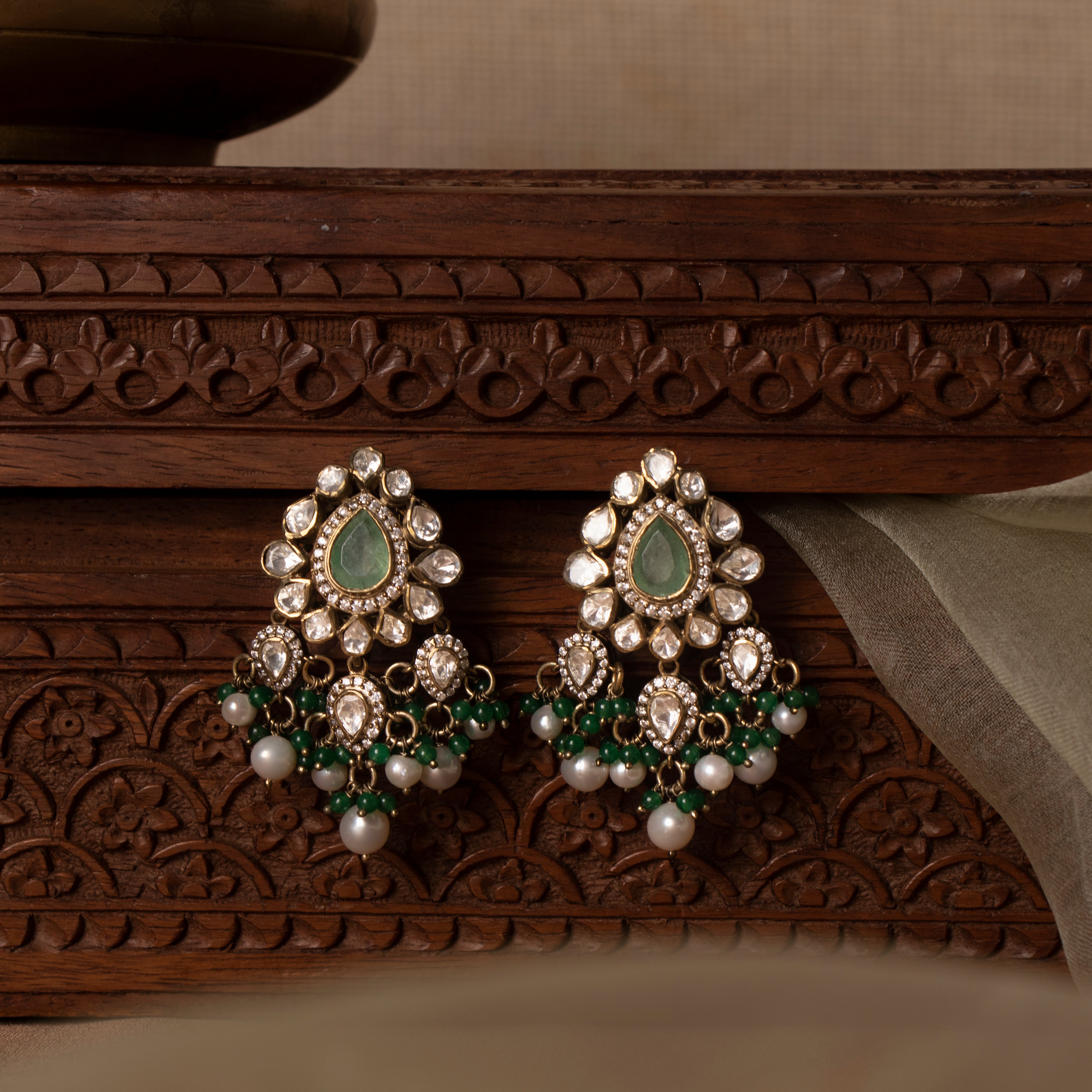 Close-up of Polki stones on Elora 925 silver hanging earrings
