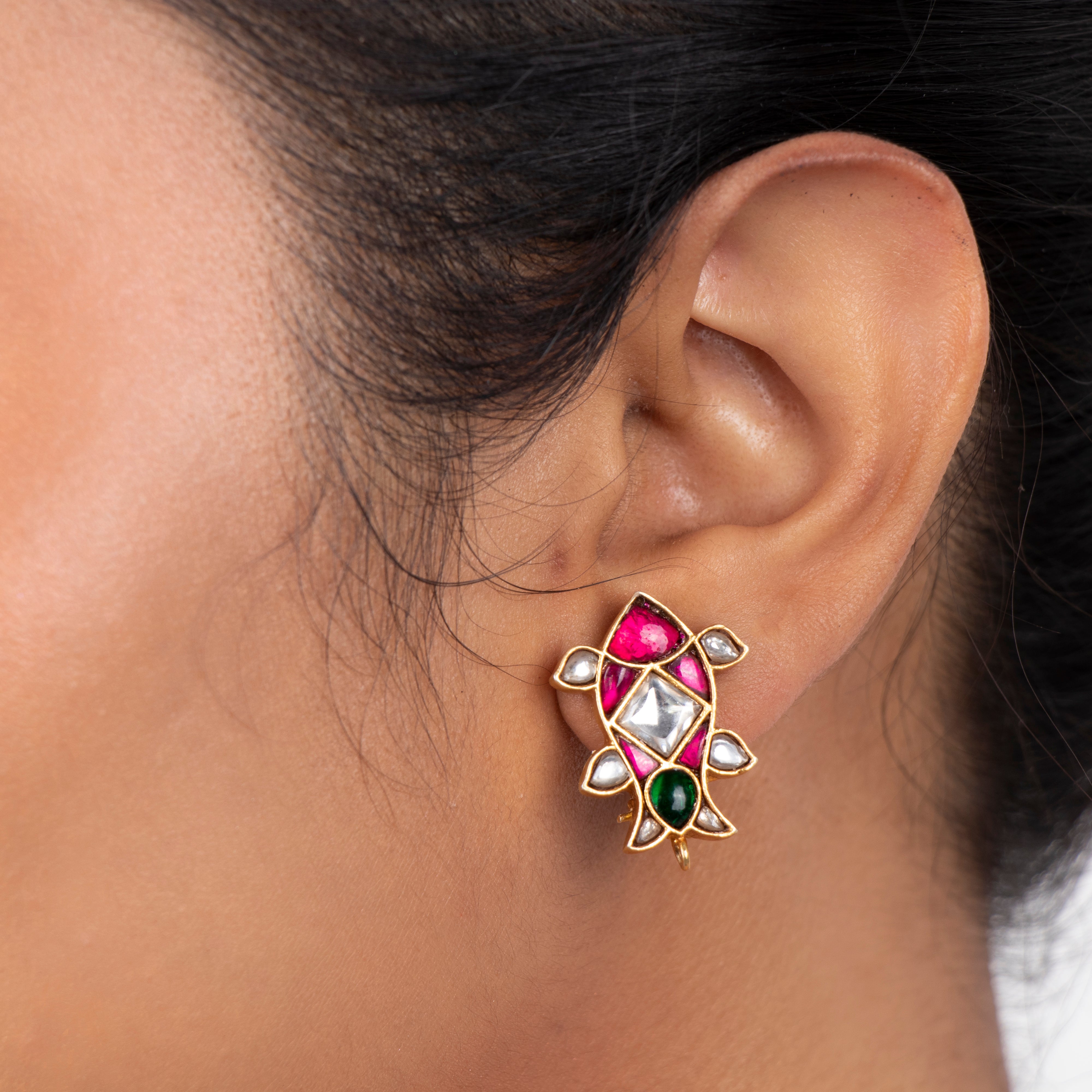 Matsya Kundan fish stud earrings worn showcasing colourful traditional design