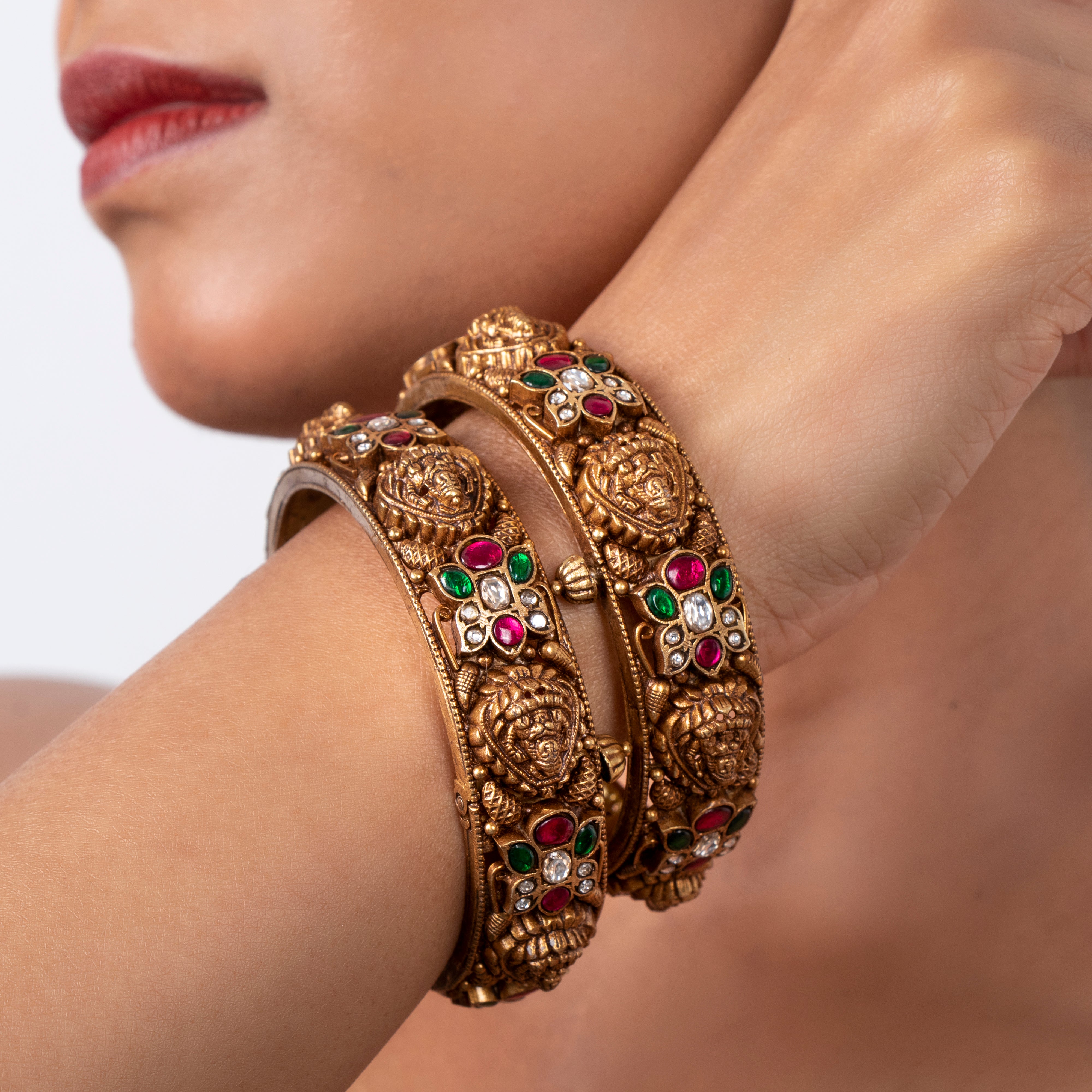 Lakshmi motif silver kundan bangle close-up with heritage temple design