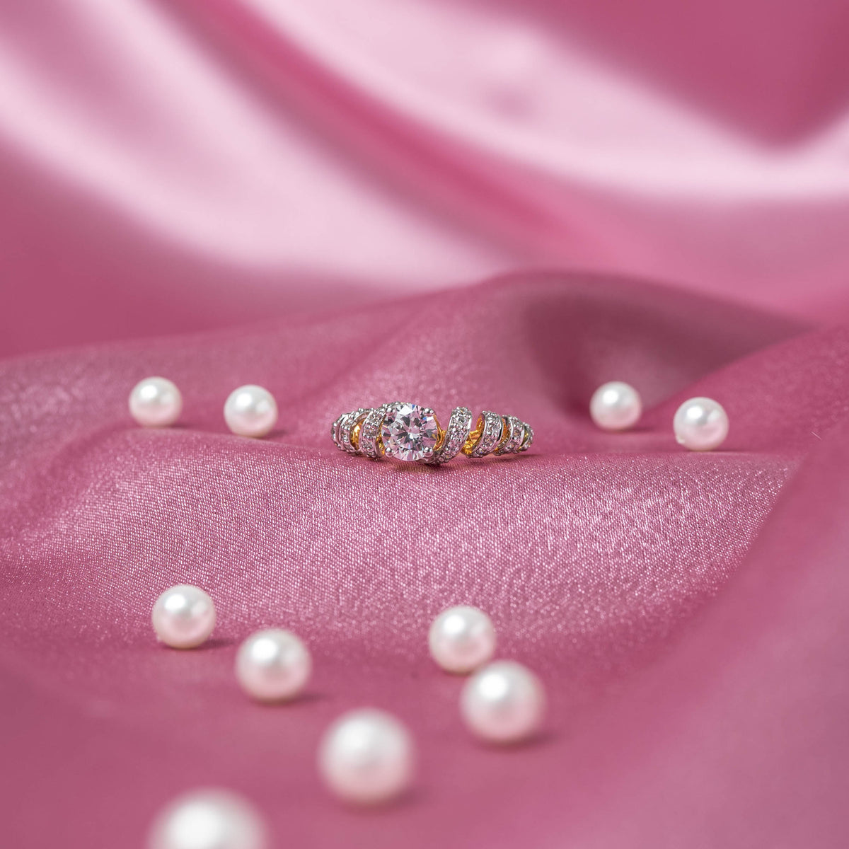 Close view of the tapered CZ shoulders and smooth inner edge of the silver band ring