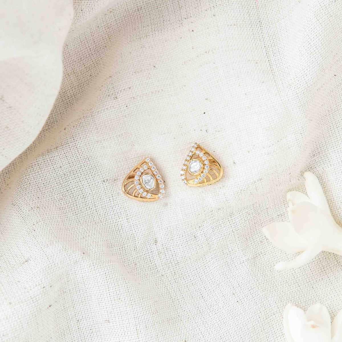Polki cluster and CZ pave edge of the jaali paisley pendant, angled in Victorian finish silver
