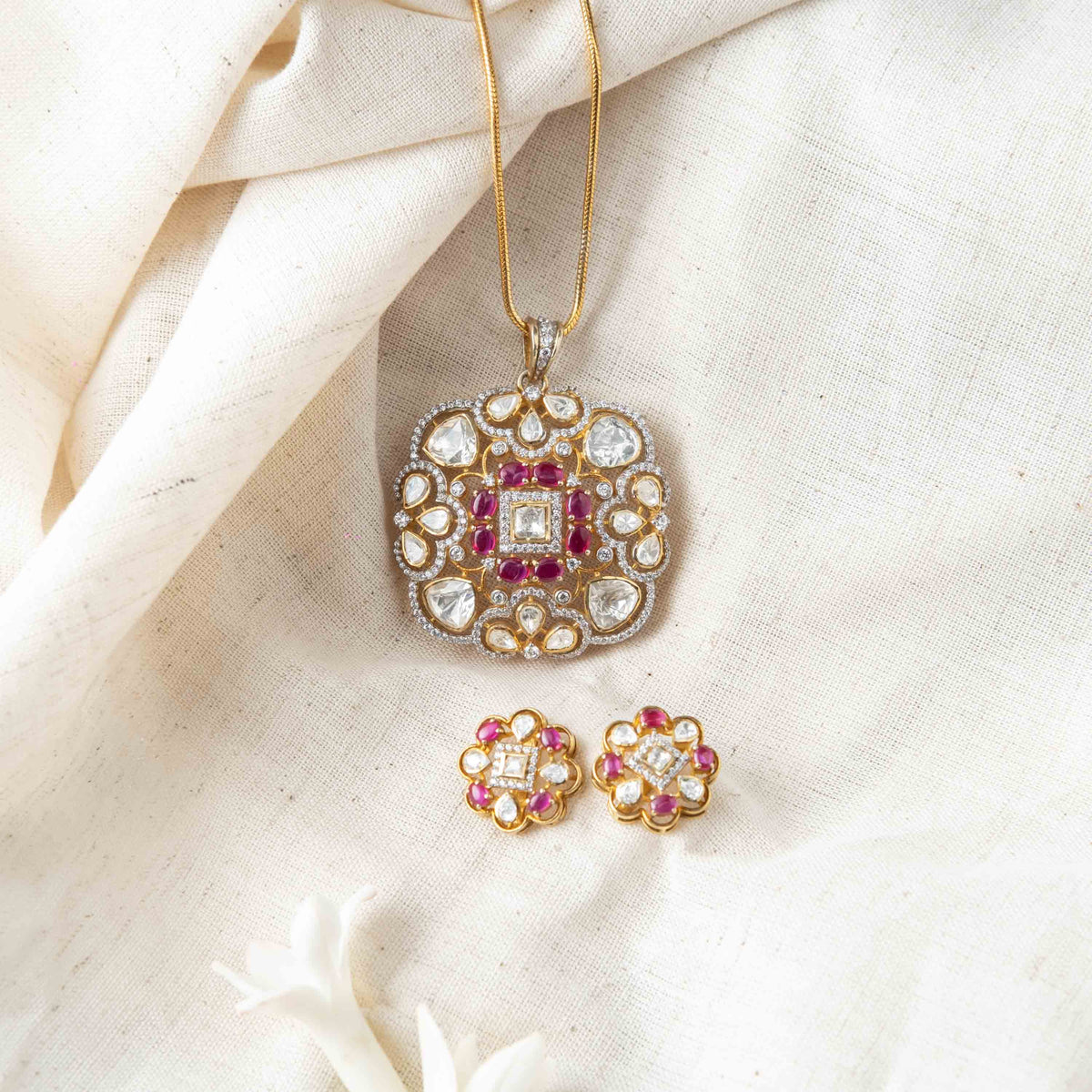 Push back posts behind the flat square polki studs in Victorian finish 925 silver