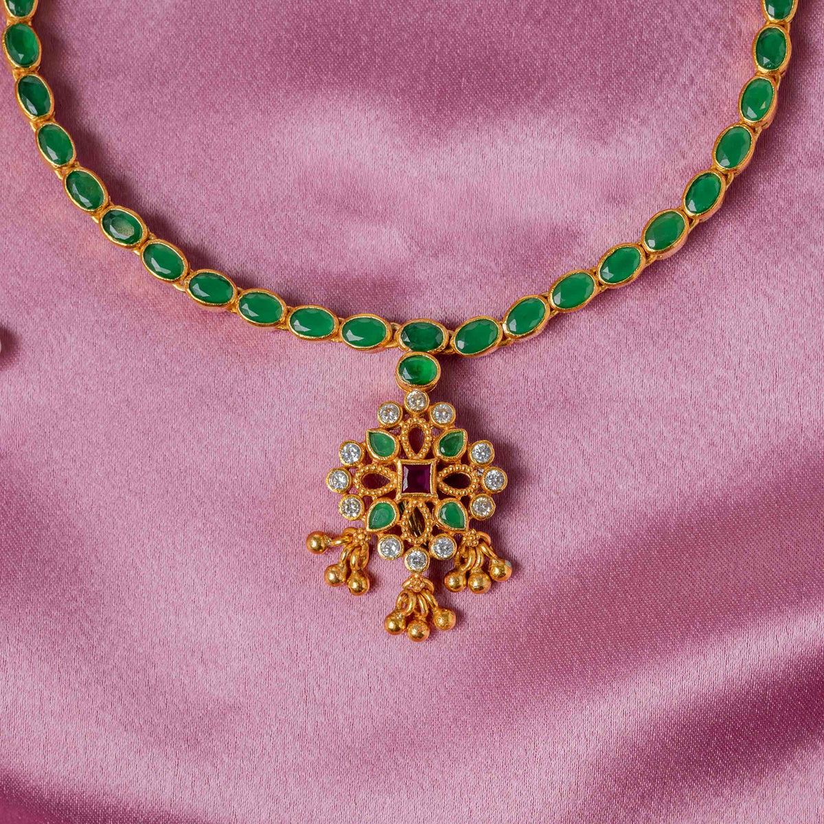 Adjustable dori and gold bead drops at the ends of the navratna short necklace in 925 silver