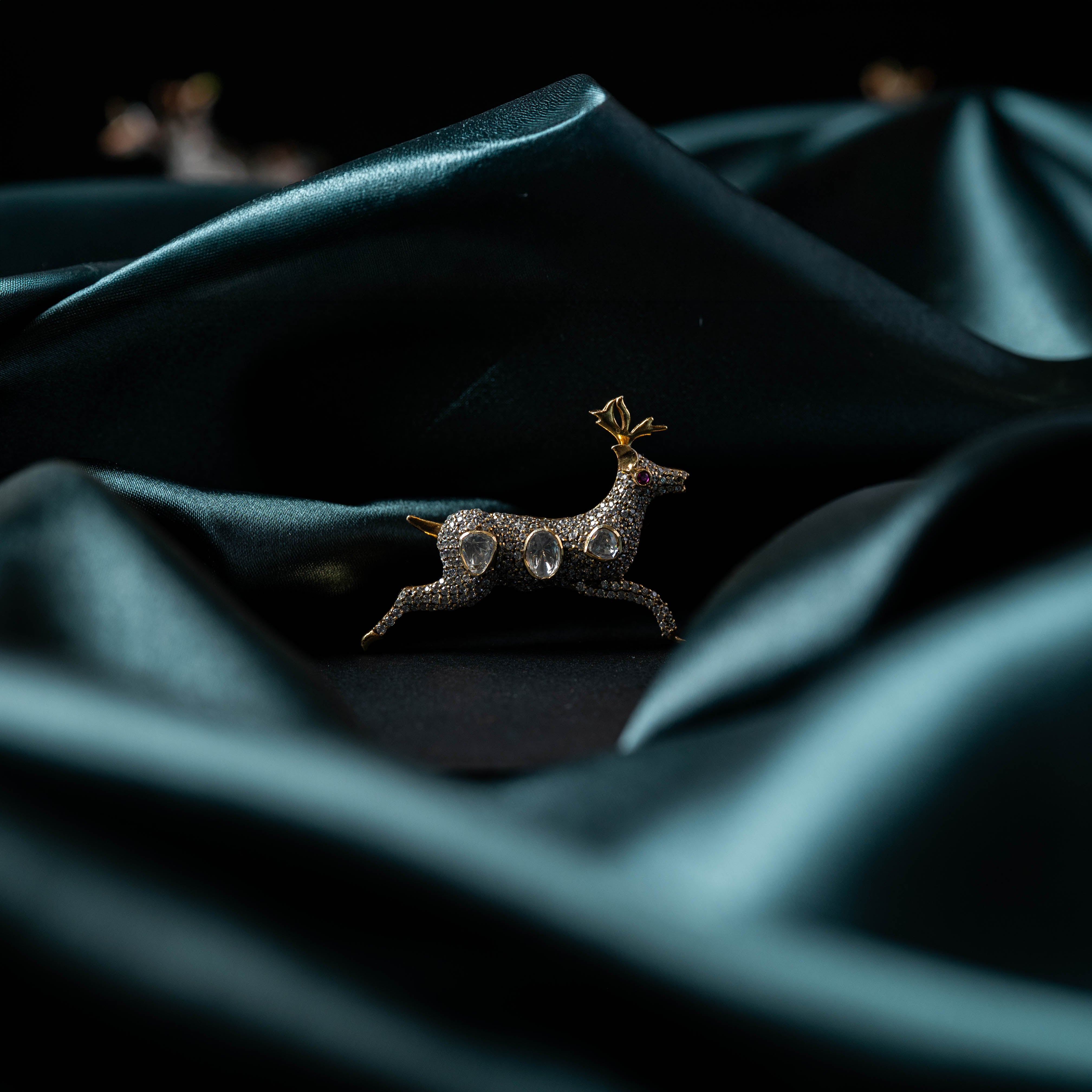 Back of the deer brooch showing the plain reverse and brooch pin, victorian plated 925 silver