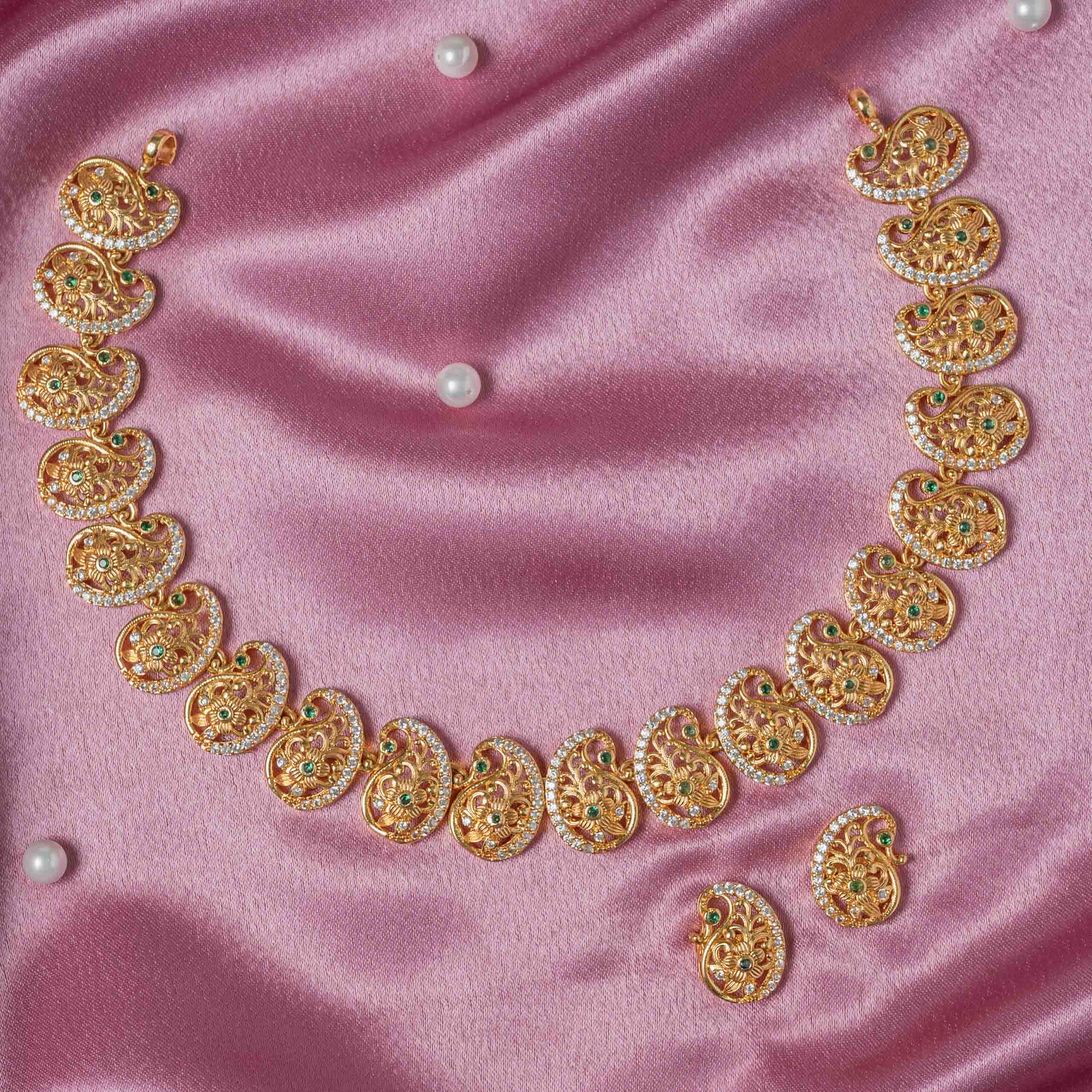 Front view of Viha CZ necklace featuring manga motifs, CZ stones and handcrafted gold-plated 925 silver design