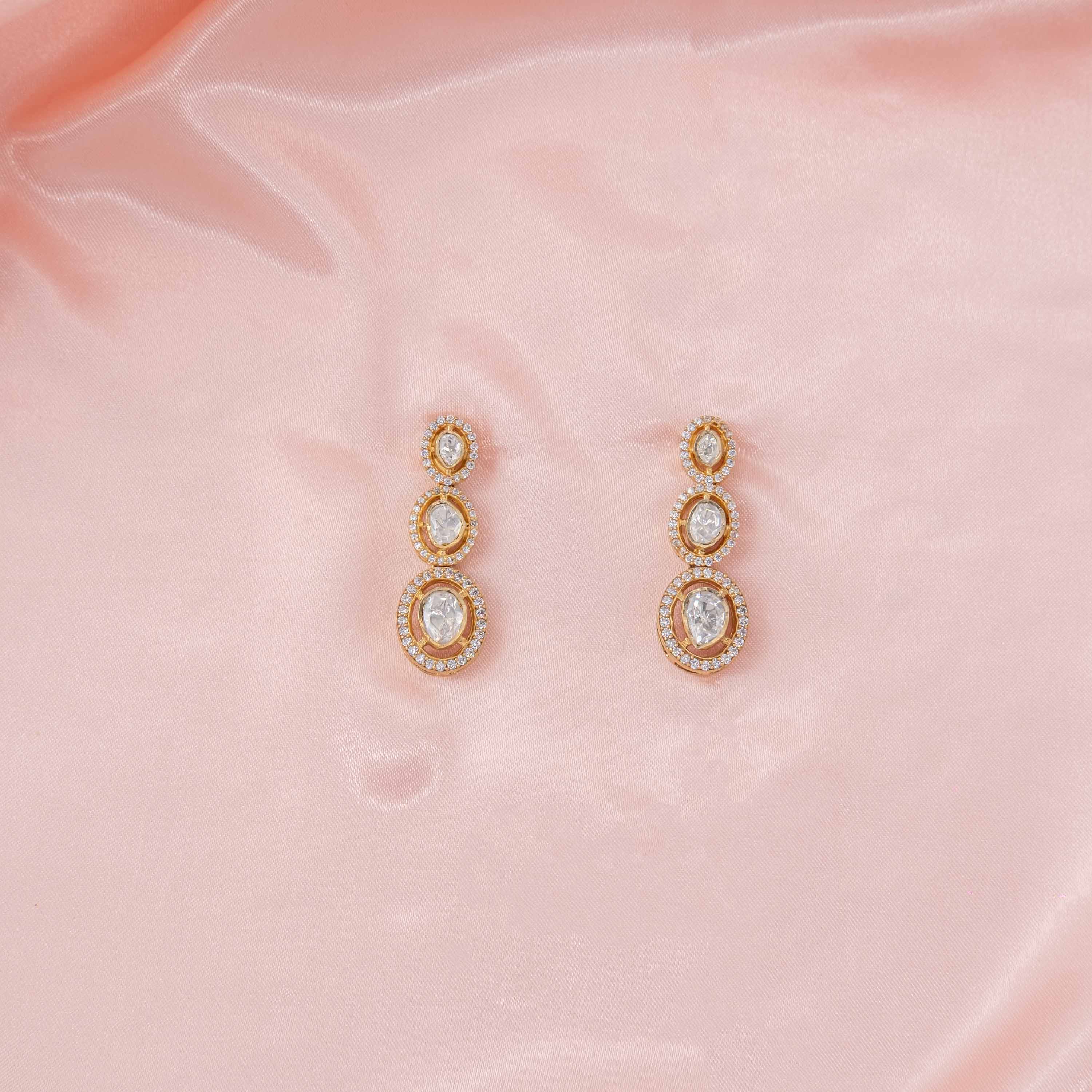 Kiara Polki Hangings in 925 sterling silver with gold plating featuring three-tier Moissanite Polki stones and sparkling CZ halos.