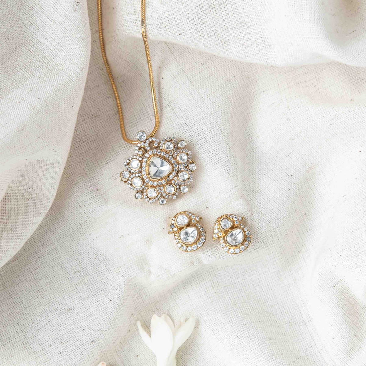 Screw back posts behind the paisley polki studs, showing the depth of the Victorian setting