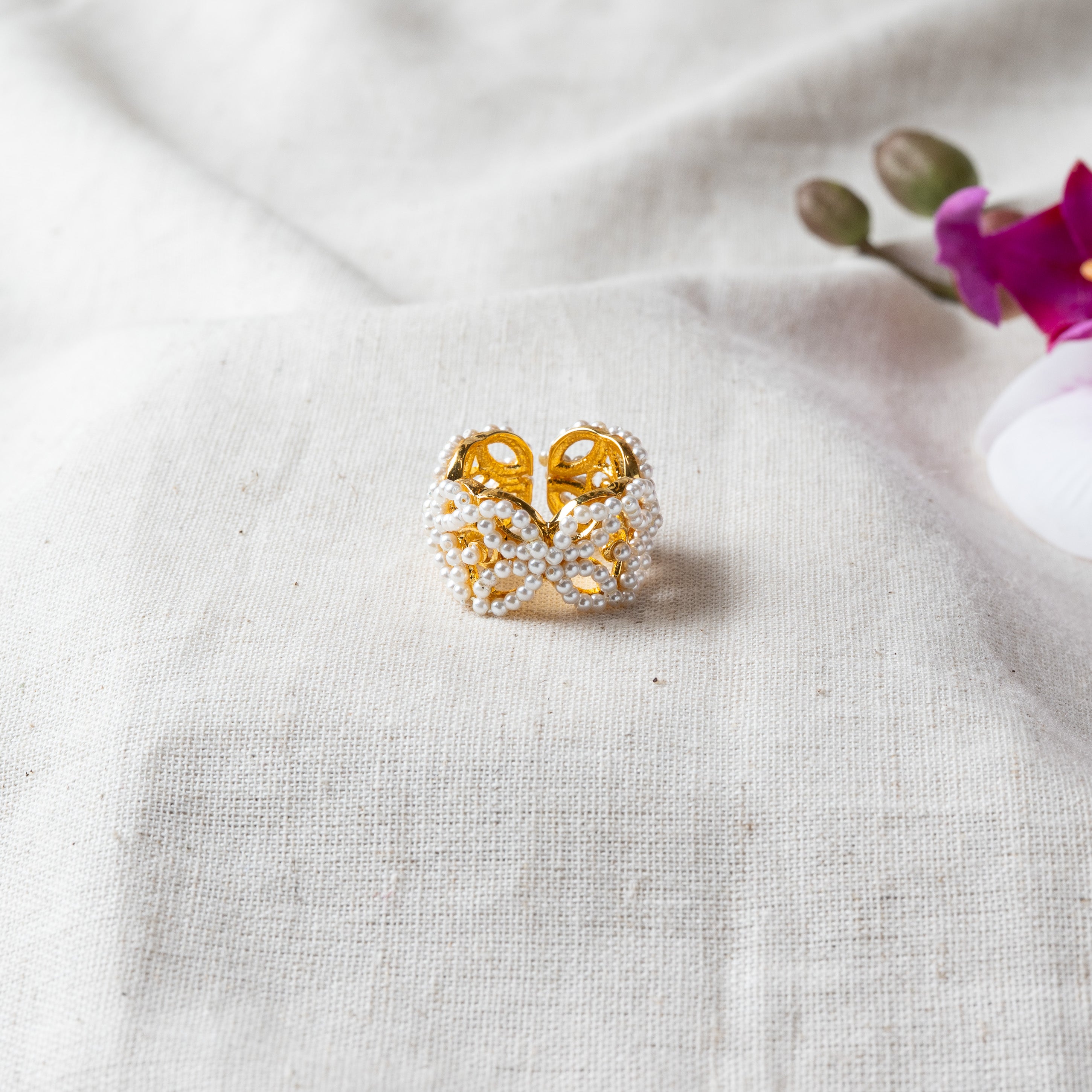 Front view of the pearl butterfly wings on the gold plated 925 silver ring