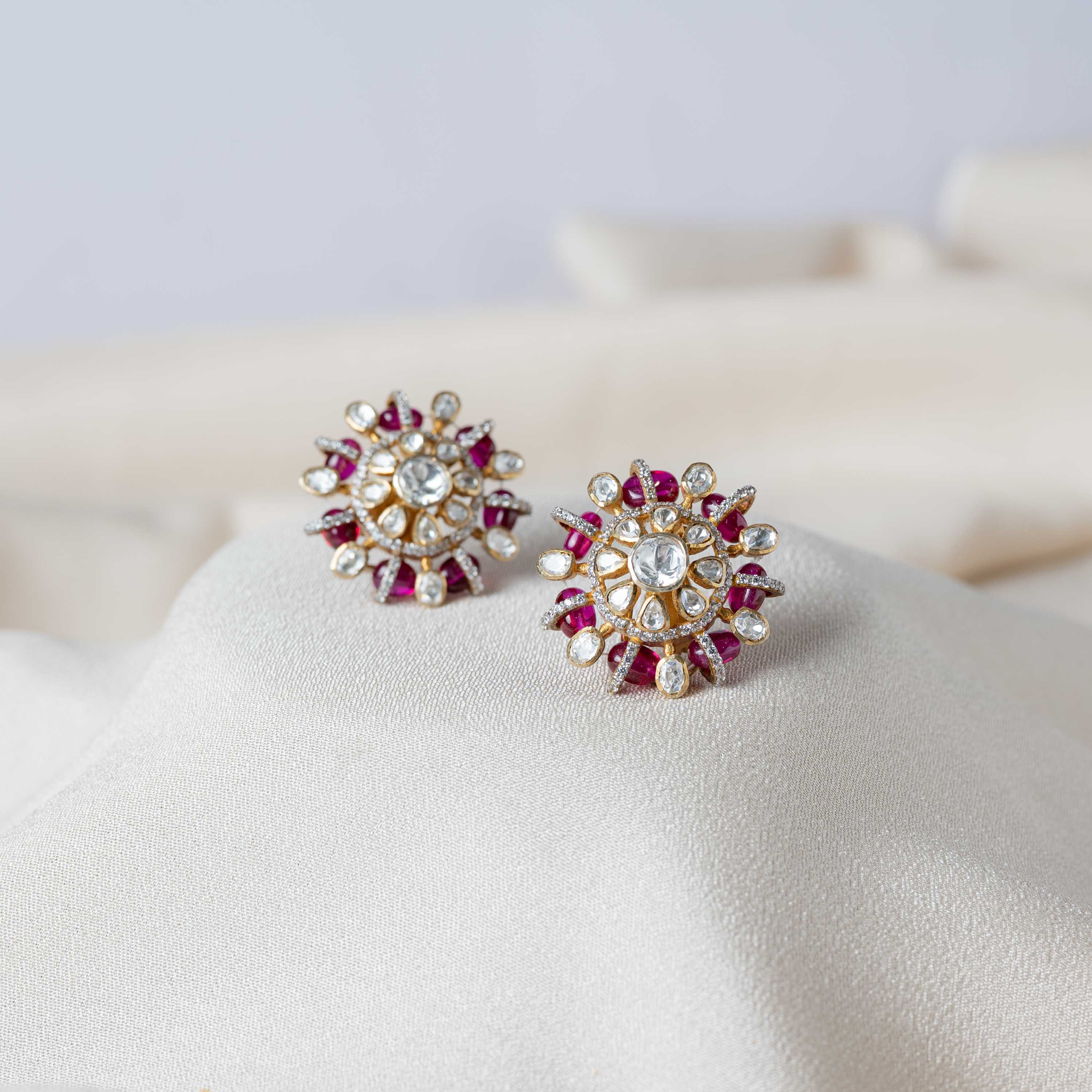Heliora CZ floral studs in 925 sterling silver with gold plating, Moissanite Polki, CZ stones and red bead accents
