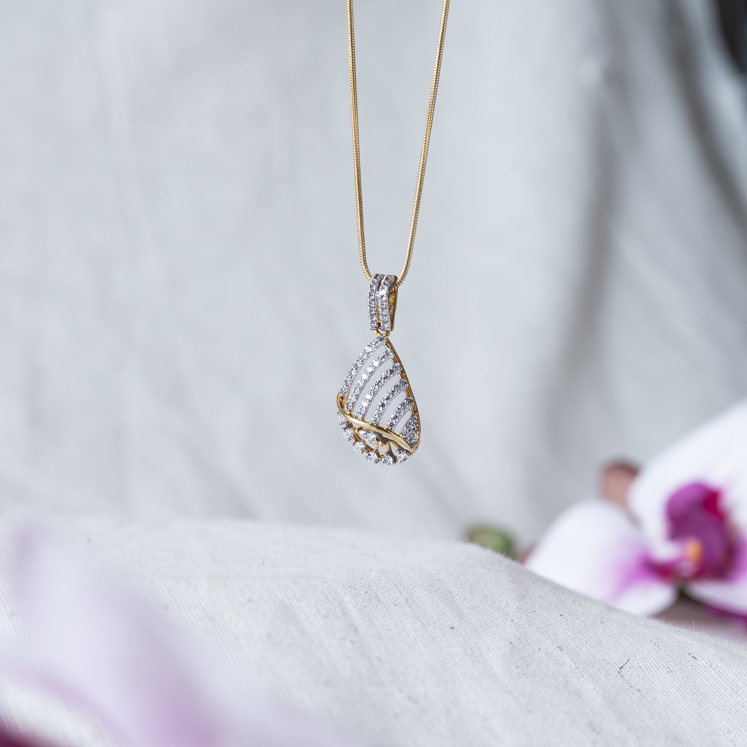 Twisted teardrop pendant paved with CZ on a slim chain, rhodium finish 925 silver