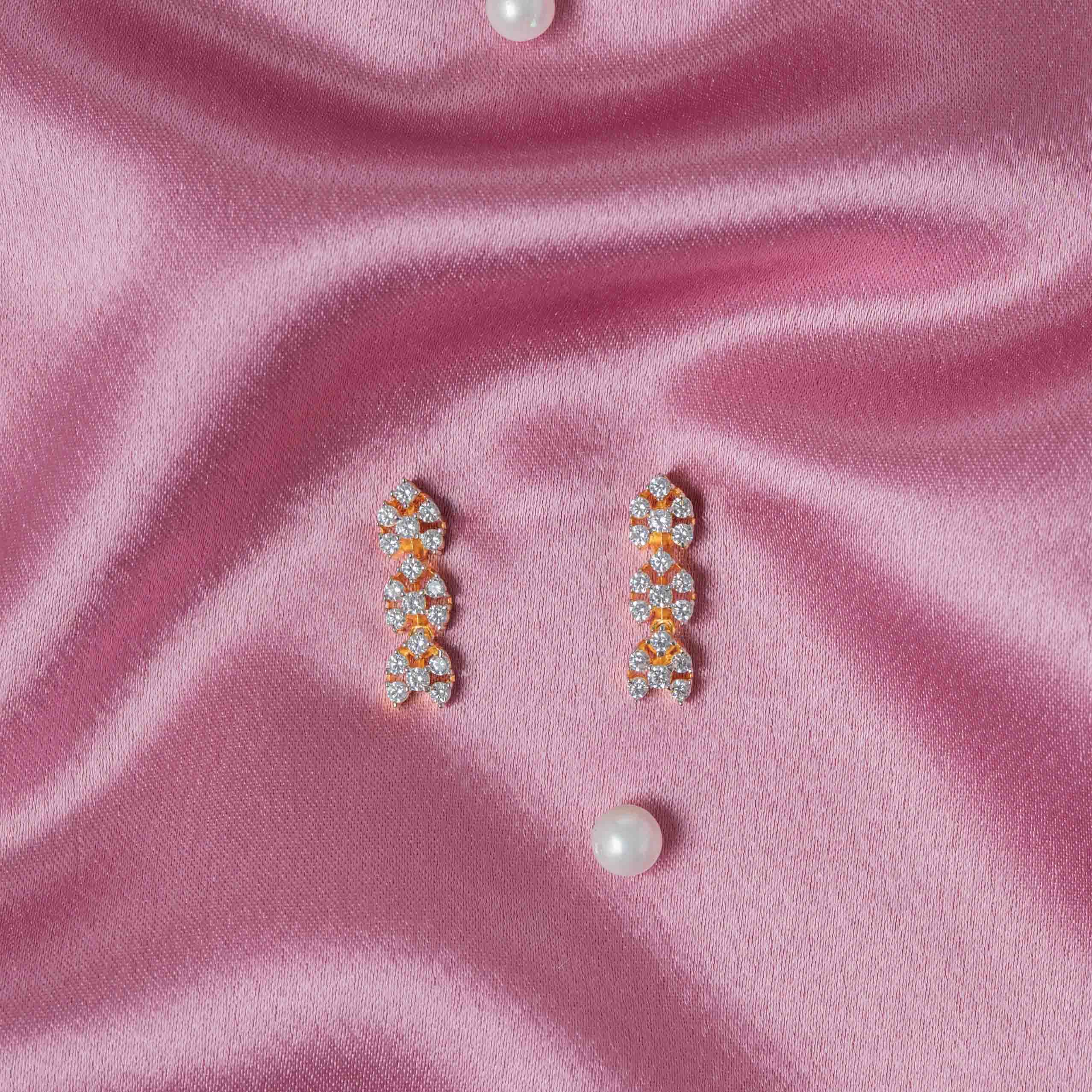 Back view of one earring showing the Bombay screw back post on the CZ floral drop