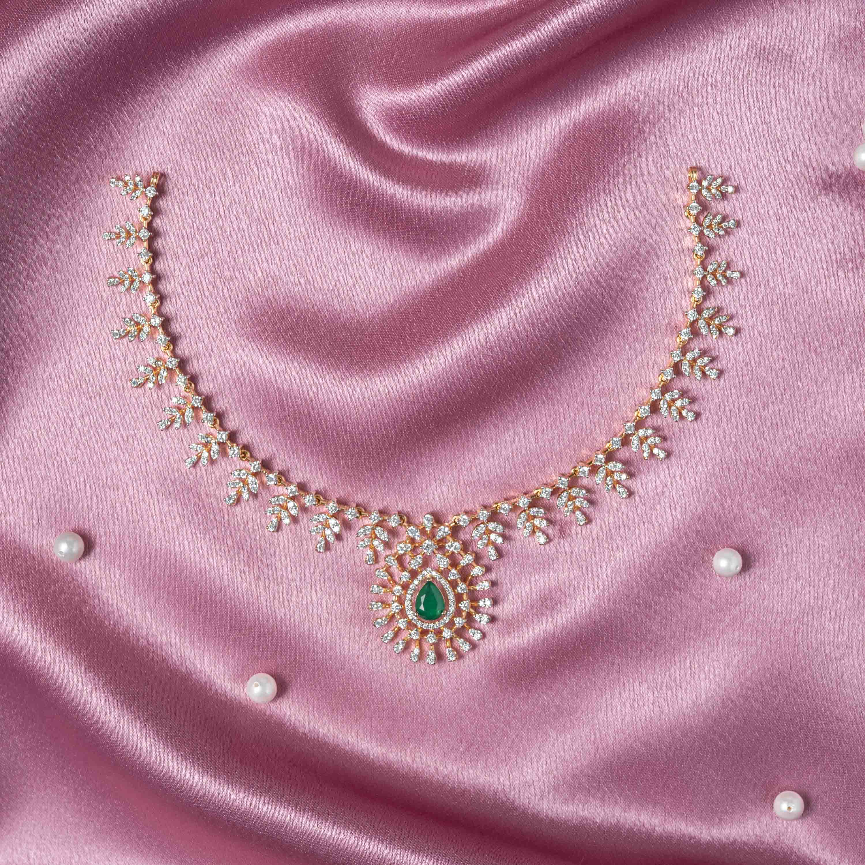 Eshna CZ necklace handcrafted in 925 sterling silver with gold plating, green onyx pendant and brilliant CZ stones for bridal and festive wear