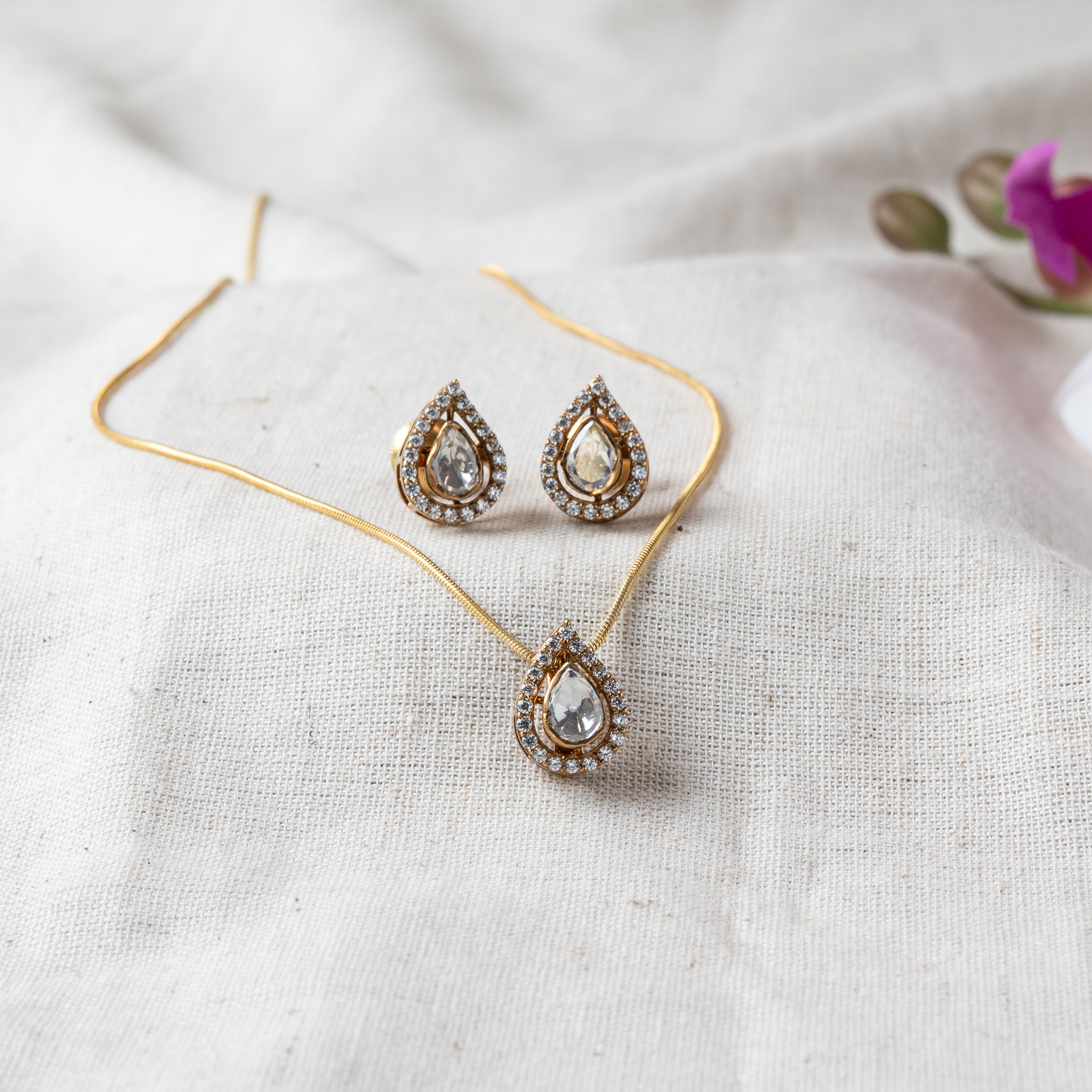 Teardrop pendant and matching studs with white stones in CZ halos, Victorian plated 925 silver
