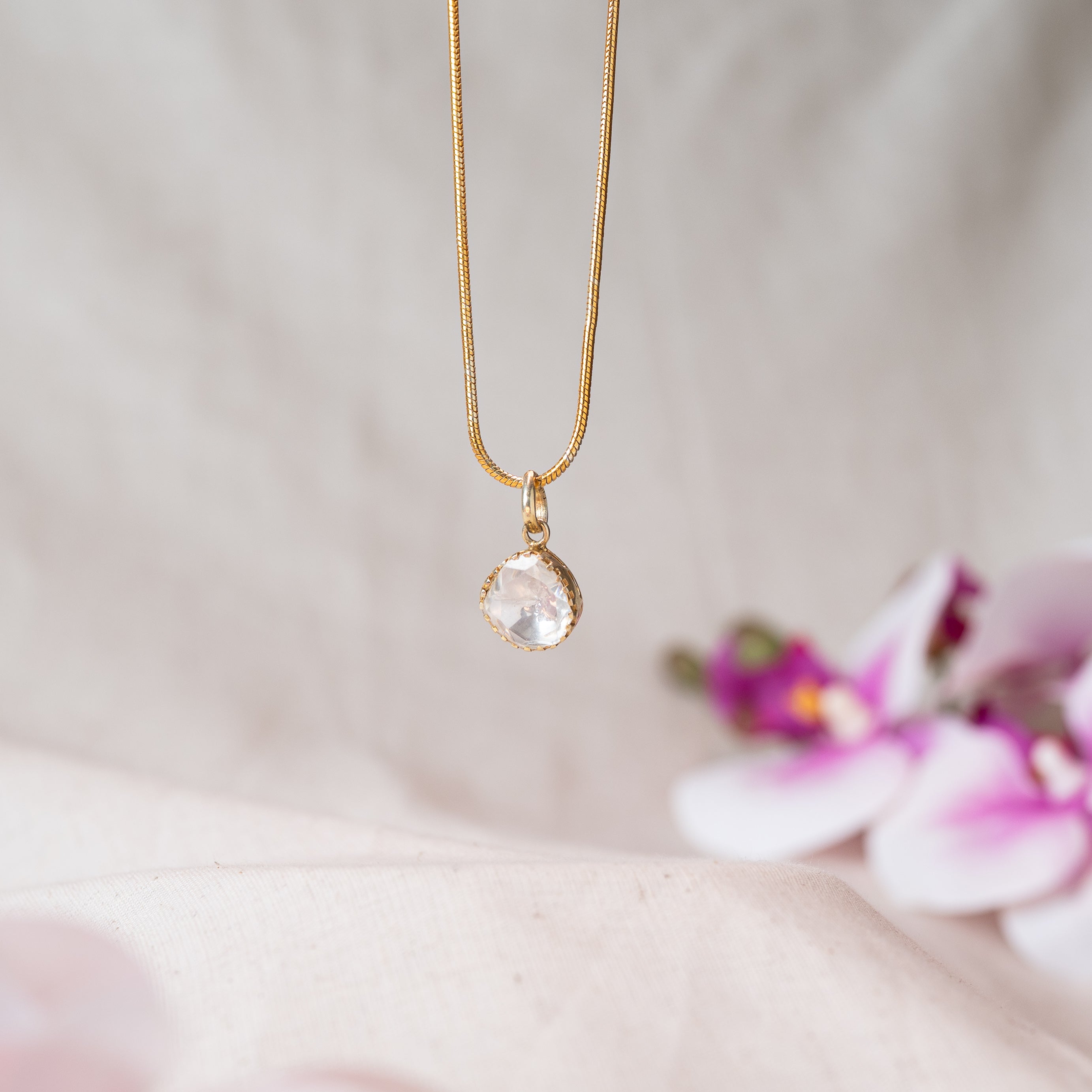 Pendant and matching polki studs together, plain bezel settings in gold plated 925 silver