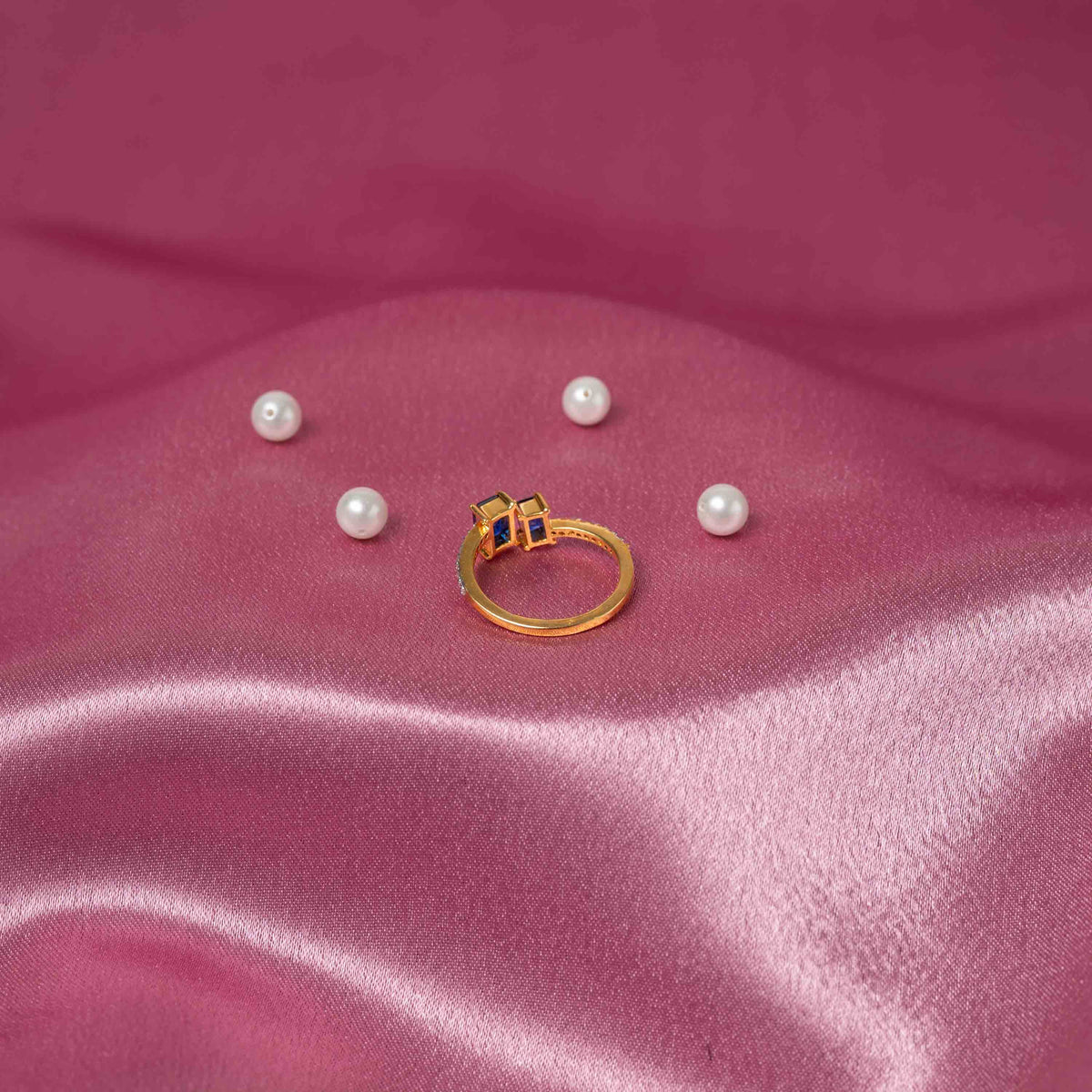 Detail of the straight deco lines and white CZ row on a slim sterling silver ring