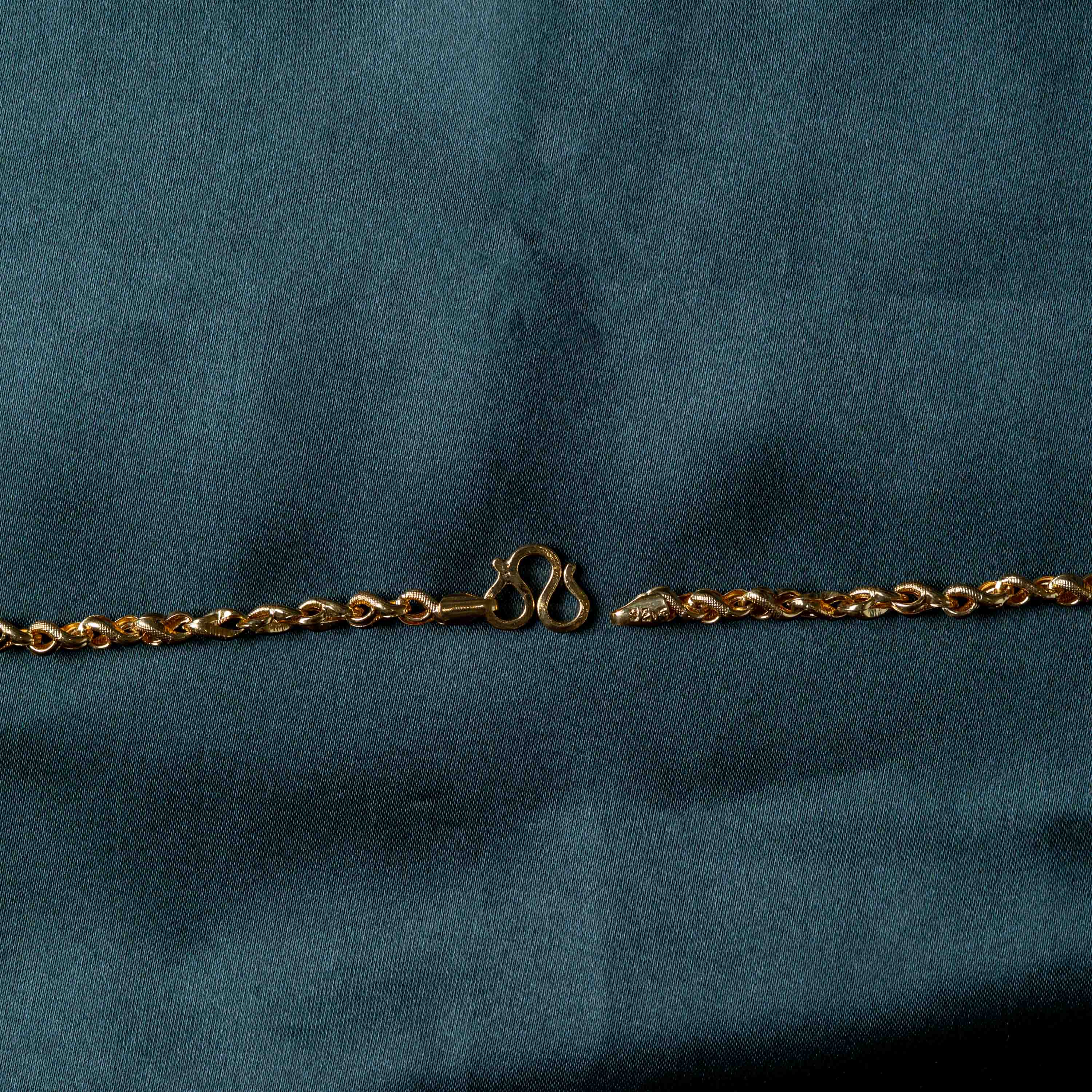 Close crop of the W hook clasp and twisted links, gold plated 925 silver